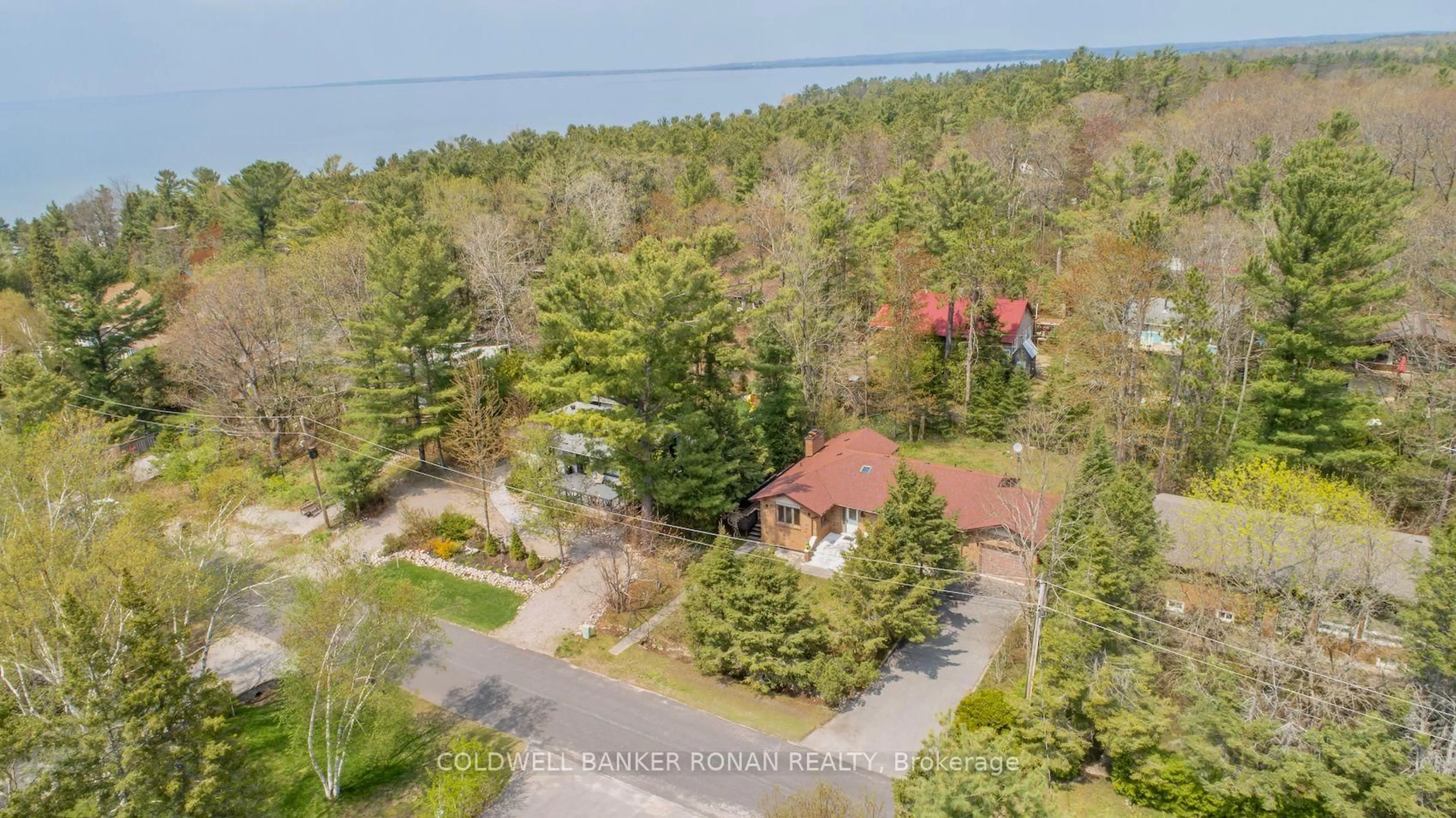 A pic from outside/outdoor area/front of a property/back of a property/a pic from drone, water/lake/river/ocean view for 24 Pine Forest Dr, Tiny Ontario L0L 2T0