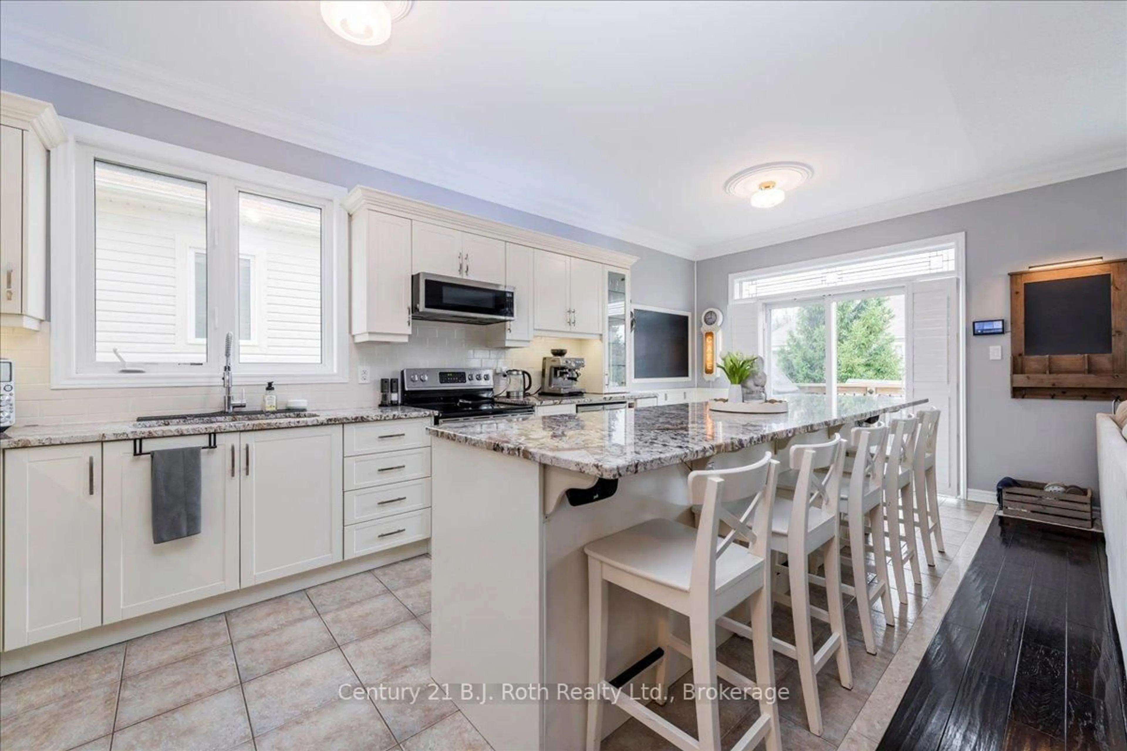 Open concept kitchen, ceramic/tile floor for 40 Grand Poplar Lane, Wasaga Beach Ontario L9Z 0E2