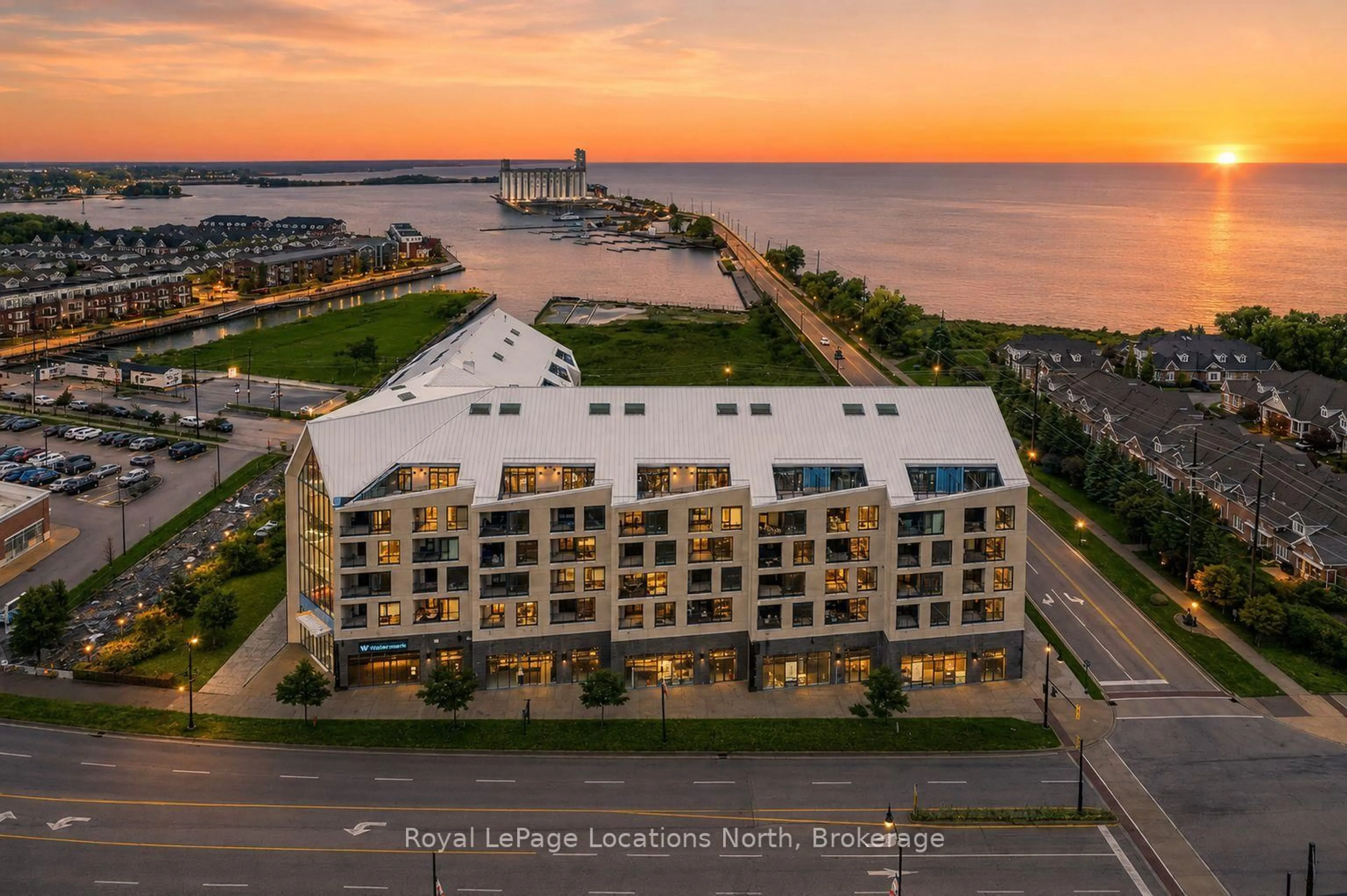 A pic from outside/outdoor area/front of a property/back of a property/a pic from drone, water/lake/river/ocean view for 31 Huron St #523, Collingwood Ontario L9Y 5T7