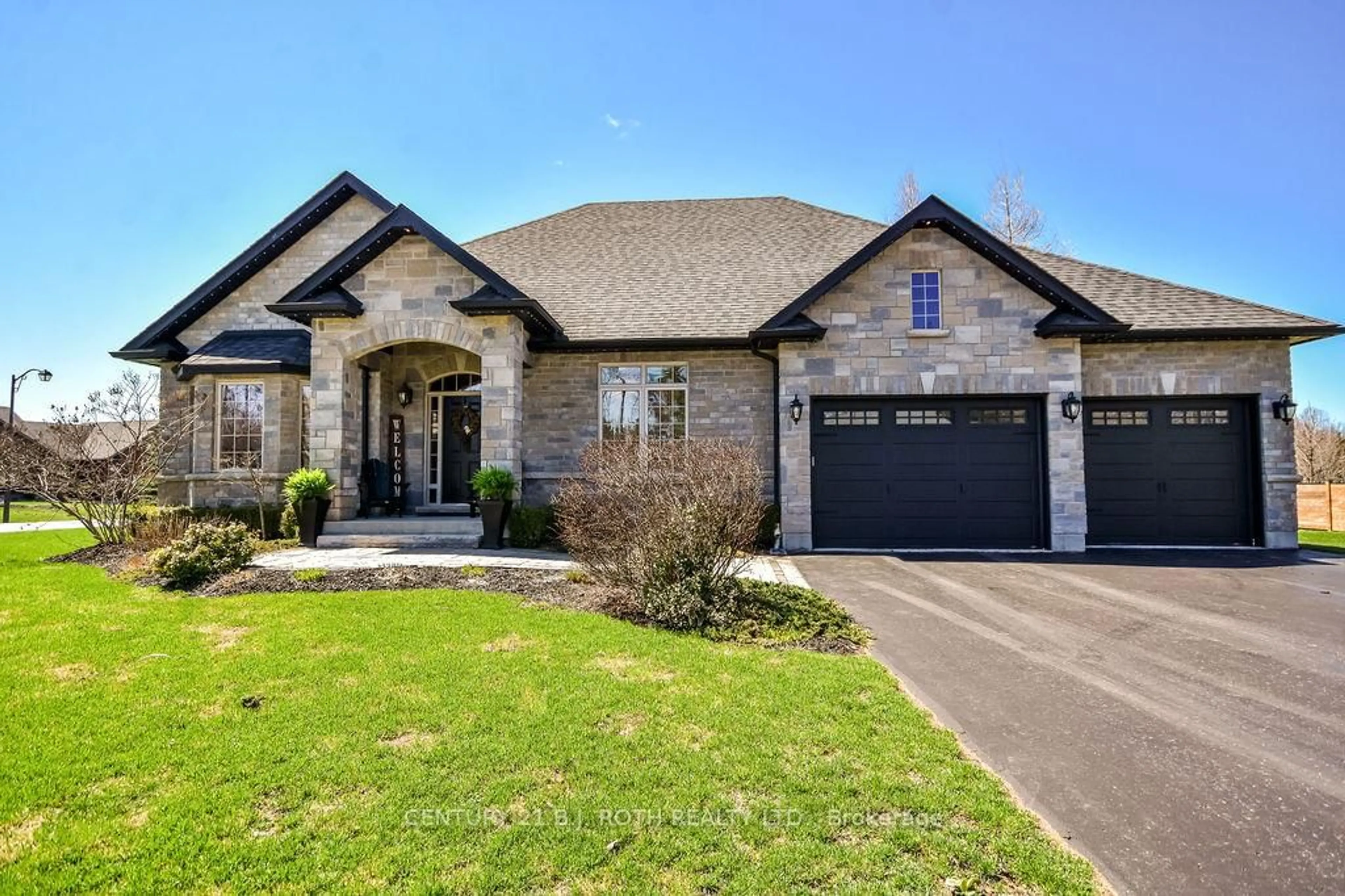 Home with brick exterior material, street for 2 Roy Hickling Dr, Springwater Ontario L9X 0J2