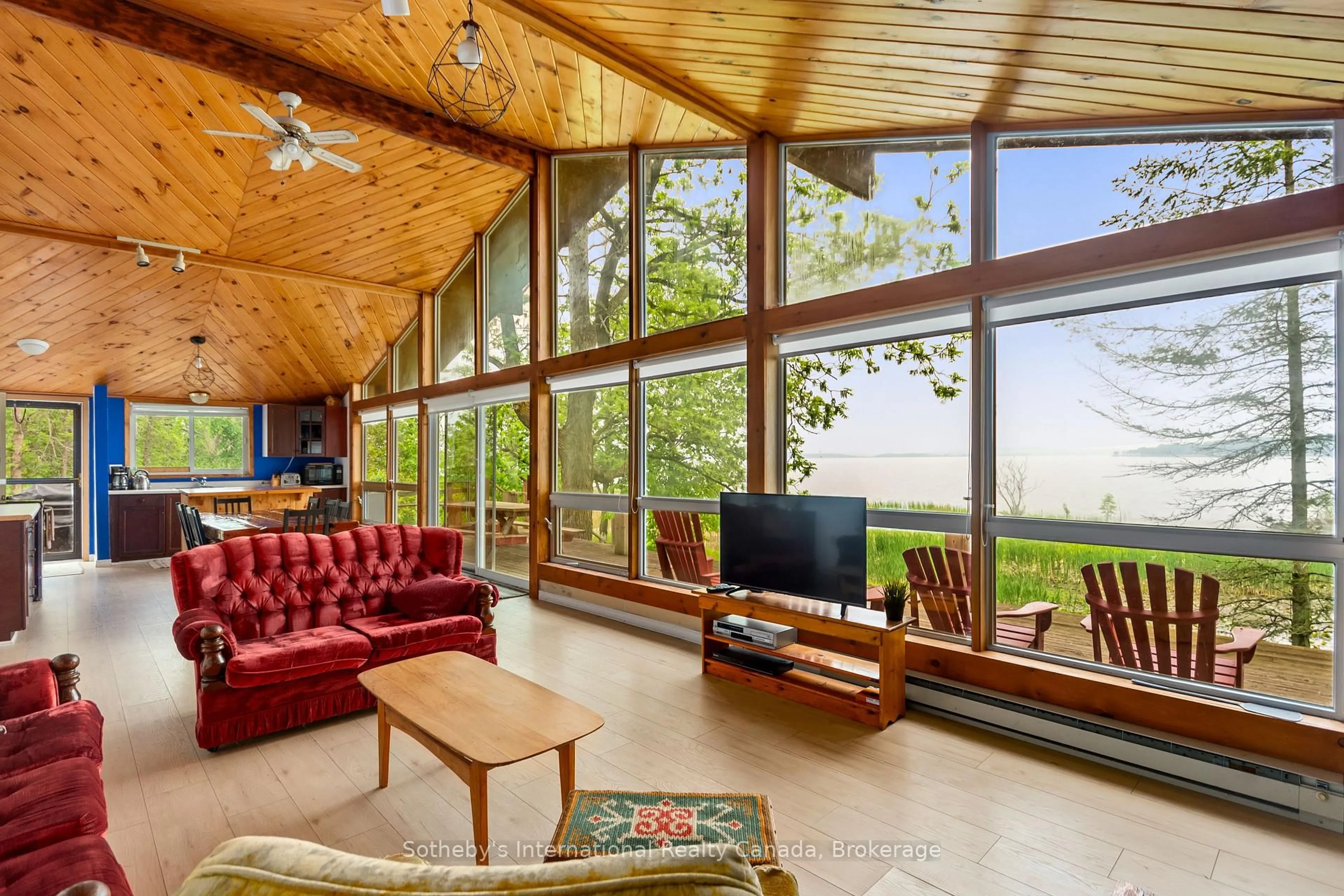 Living room with furniture, wood/laminate floor for 10 & 11 Methodist Island, Tay Ontario L0K 1R0