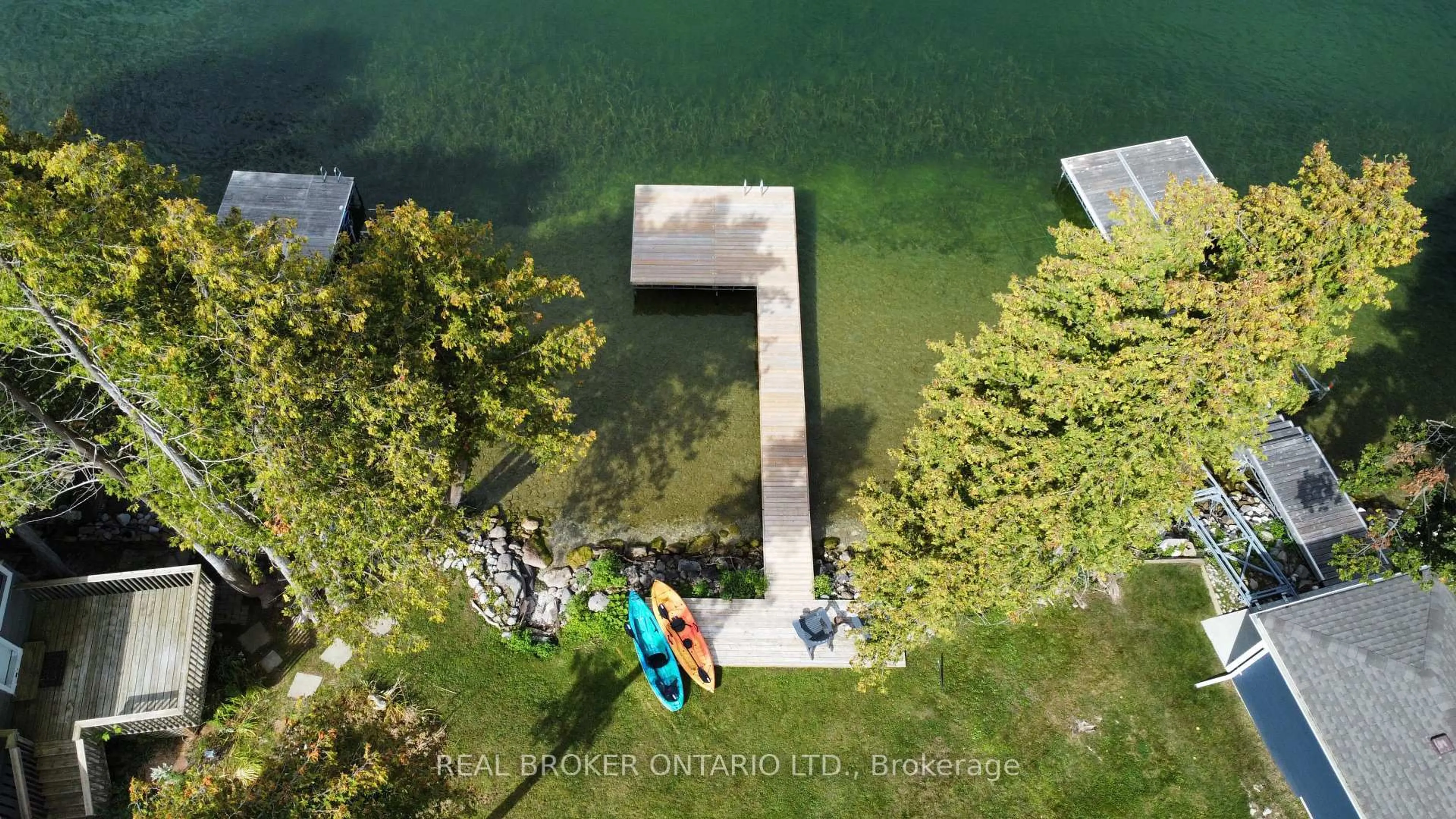 A pic from outside/outdoor area/front of a property/back of a property/a pic from drone, water/lake/river/ocean view for 5818 Victoria Park Rd, Ramara Ontario L3V 0T3