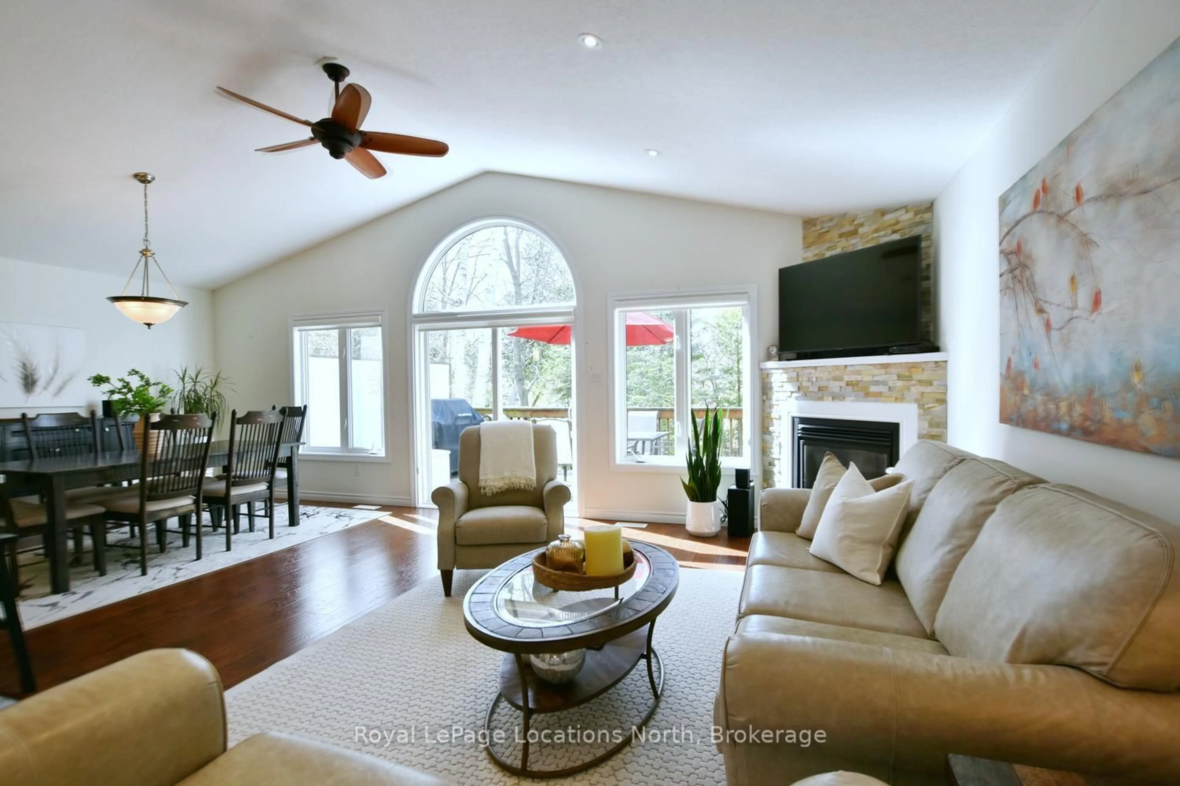 Living room with furniture, ceramic/tile floor for 155 Lily Dr, Wasaga Beach Ontario L9Z 2Z5