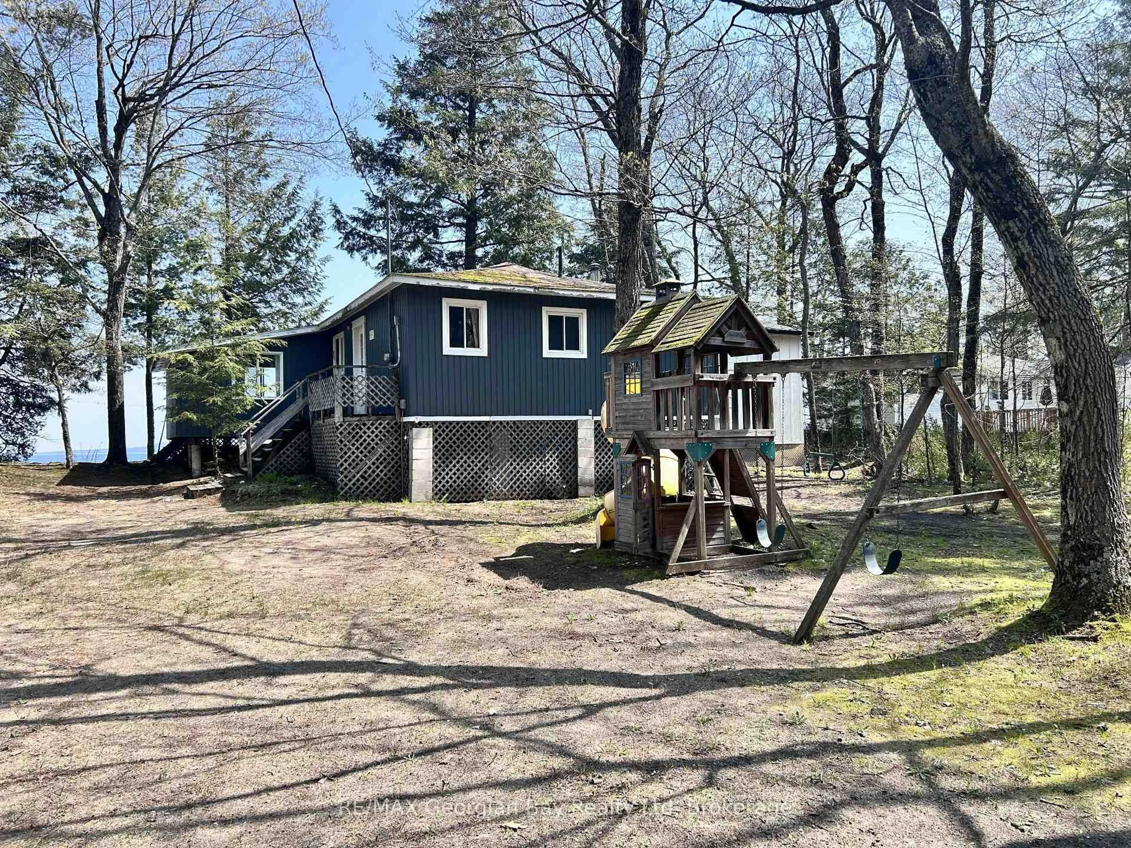 A pic from outside/outdoor area/front of a property/back of a property/a pic from drone, unknown for 589 Mkade Kegwin Miikan Rd, Christian Island 30 Ontario L9M 0A9