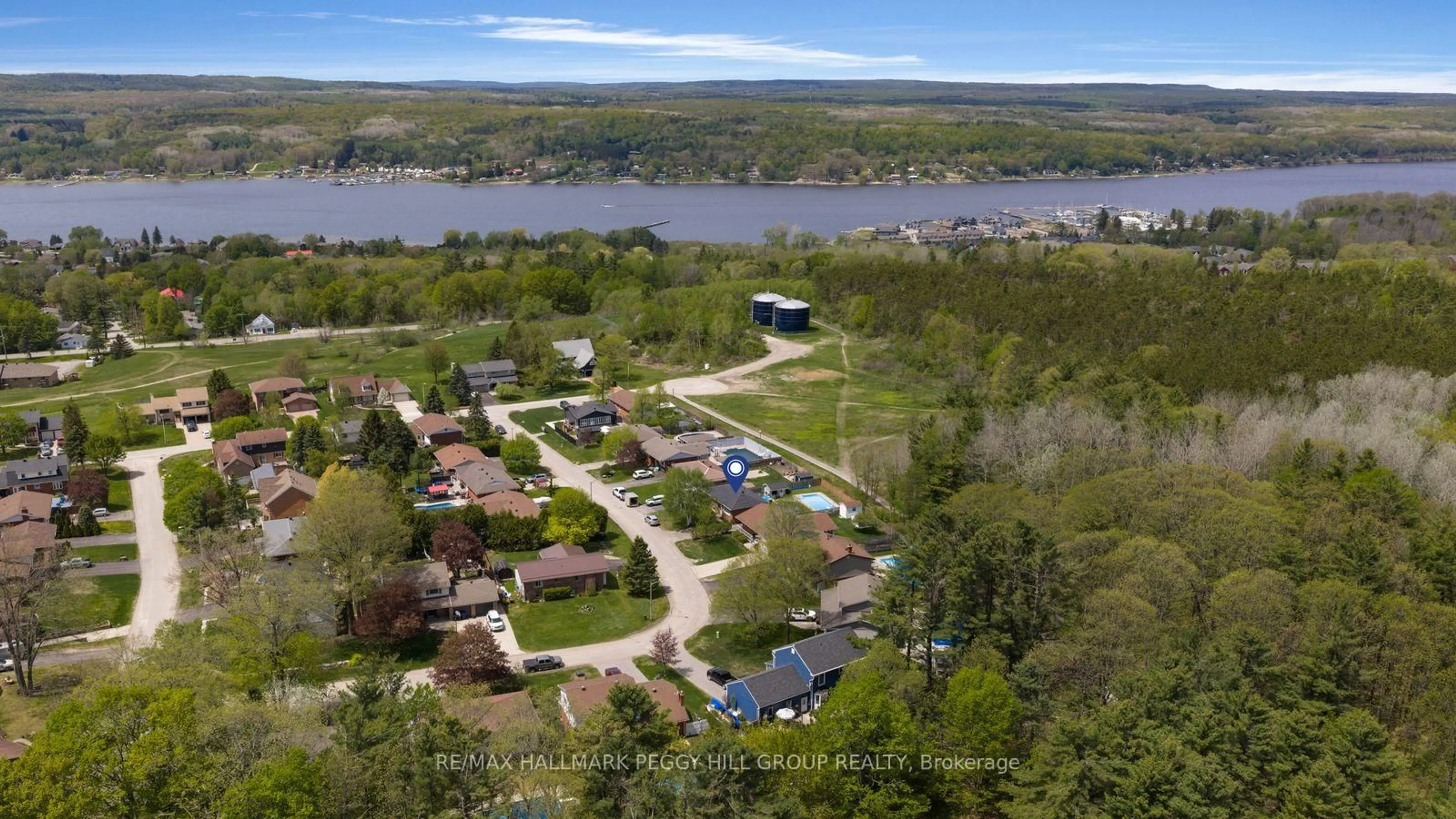 A pic from outside/outdoor area/front of a property/back of a property/a pic from drone, water/lake/river/ocean view for 32 Kerr Dr, Penetanguishene Ontario L9M 1H6