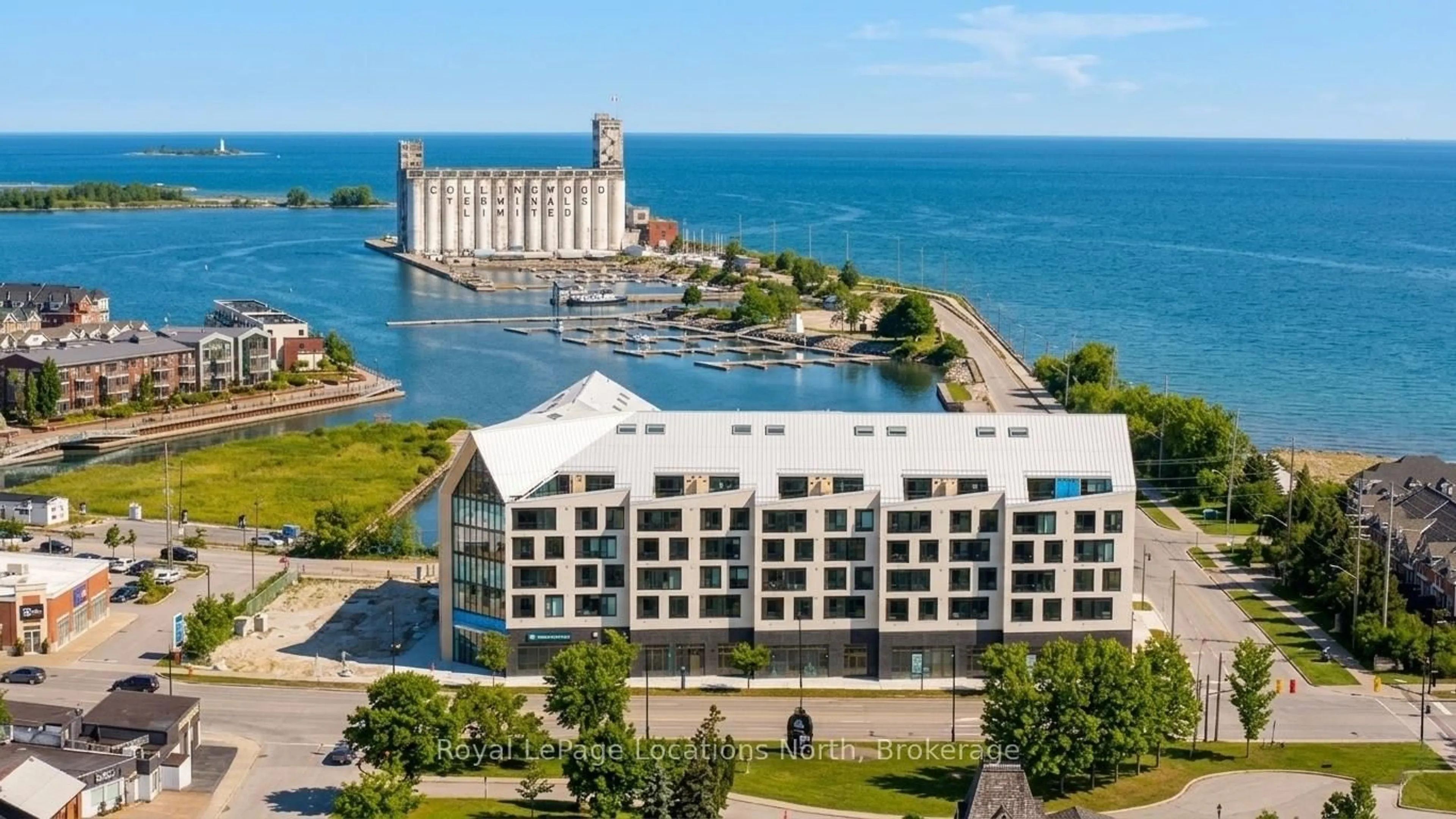 A pic from outside/outdoor area/front of a property/back of a property/a pic from drone, water/lake/river/ocean view for 31 Huron St #501, Collingwood Ontario L9Y 1C3