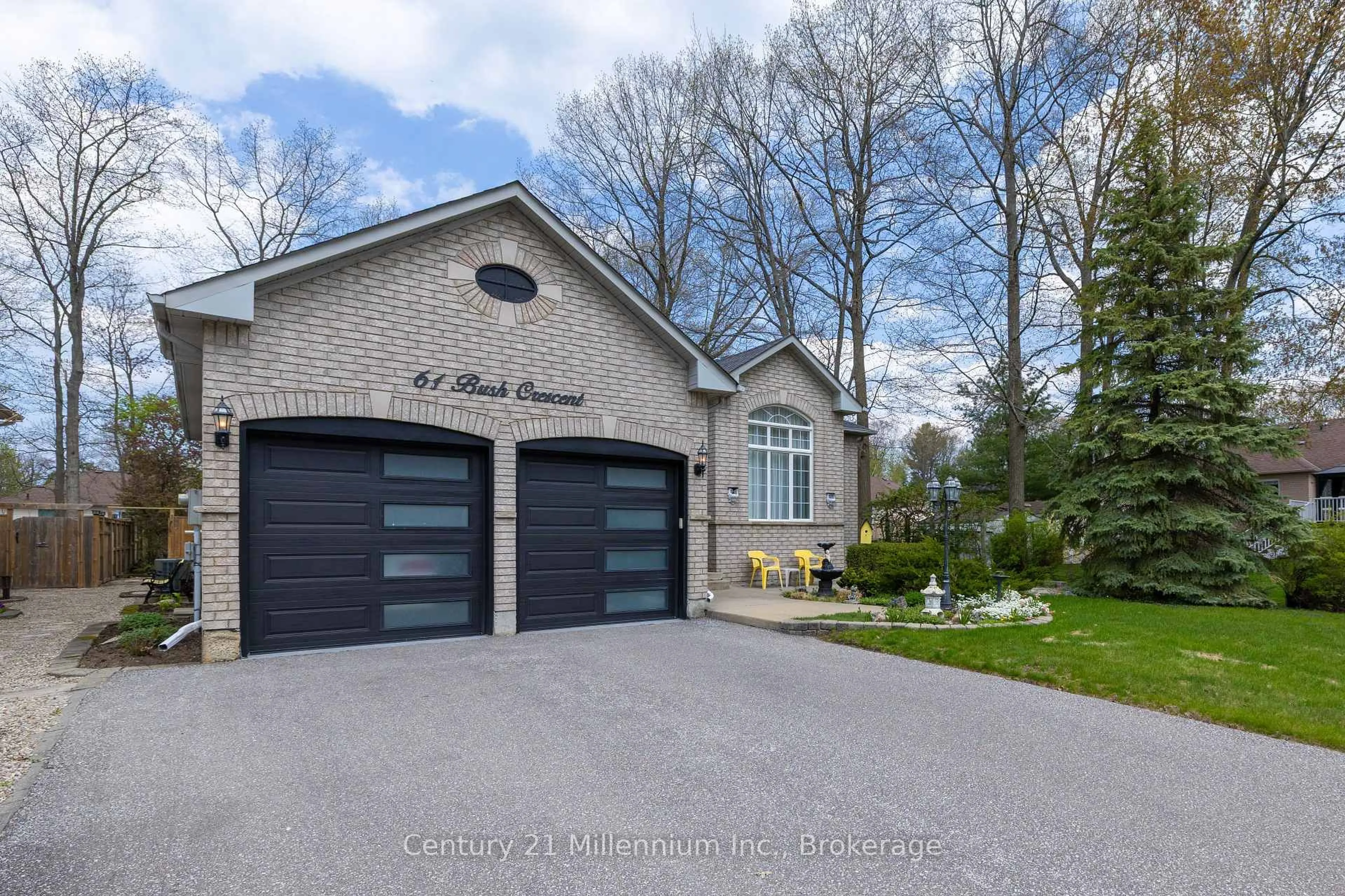 Home with brick exterior material, street for 61 Bush Cres, Wasaga Beach Ontario L9Z 1N1