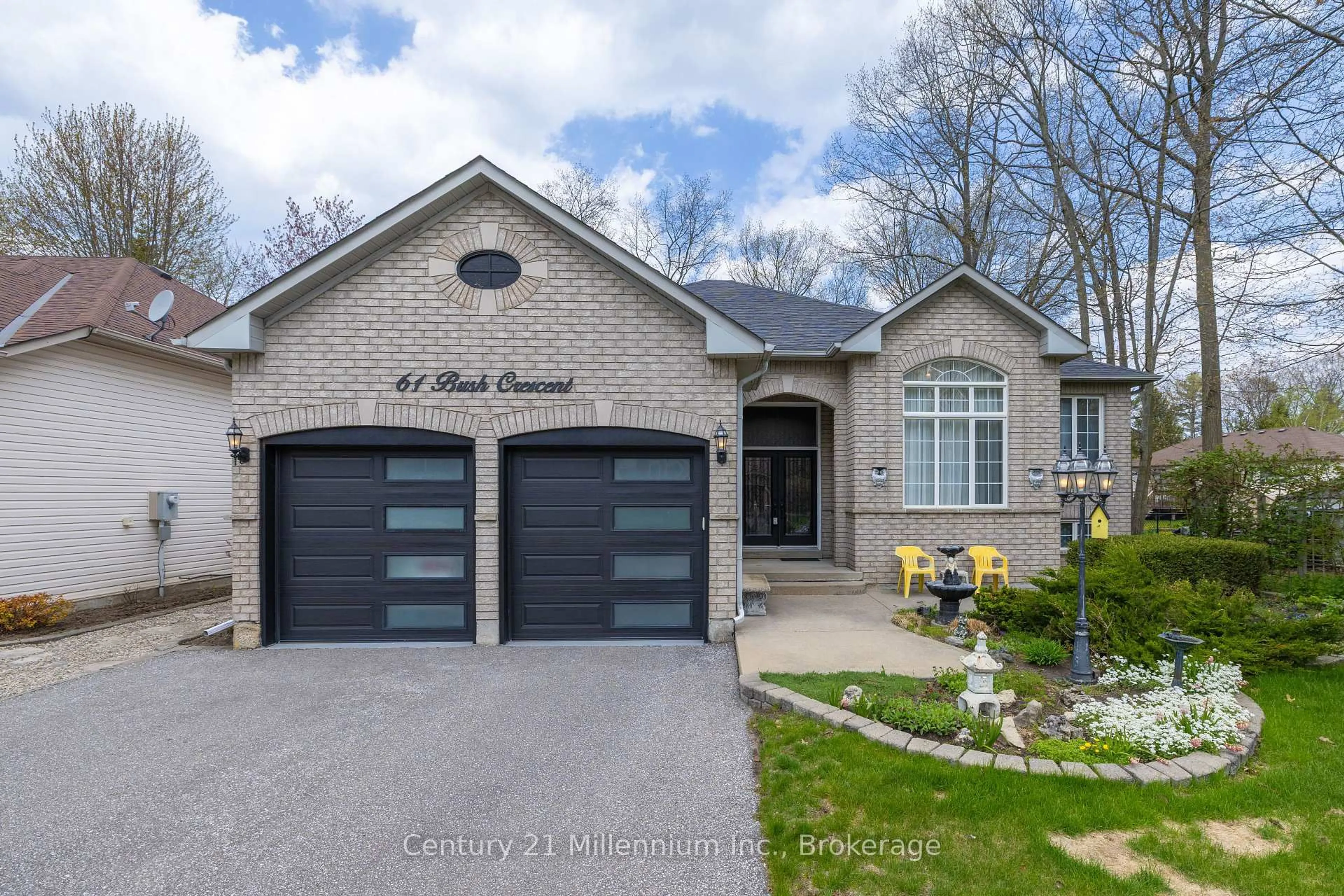 Home with brick exterior material, street for 61 Bush Cres, Wasaga Beach Ontario L9Z 1N1