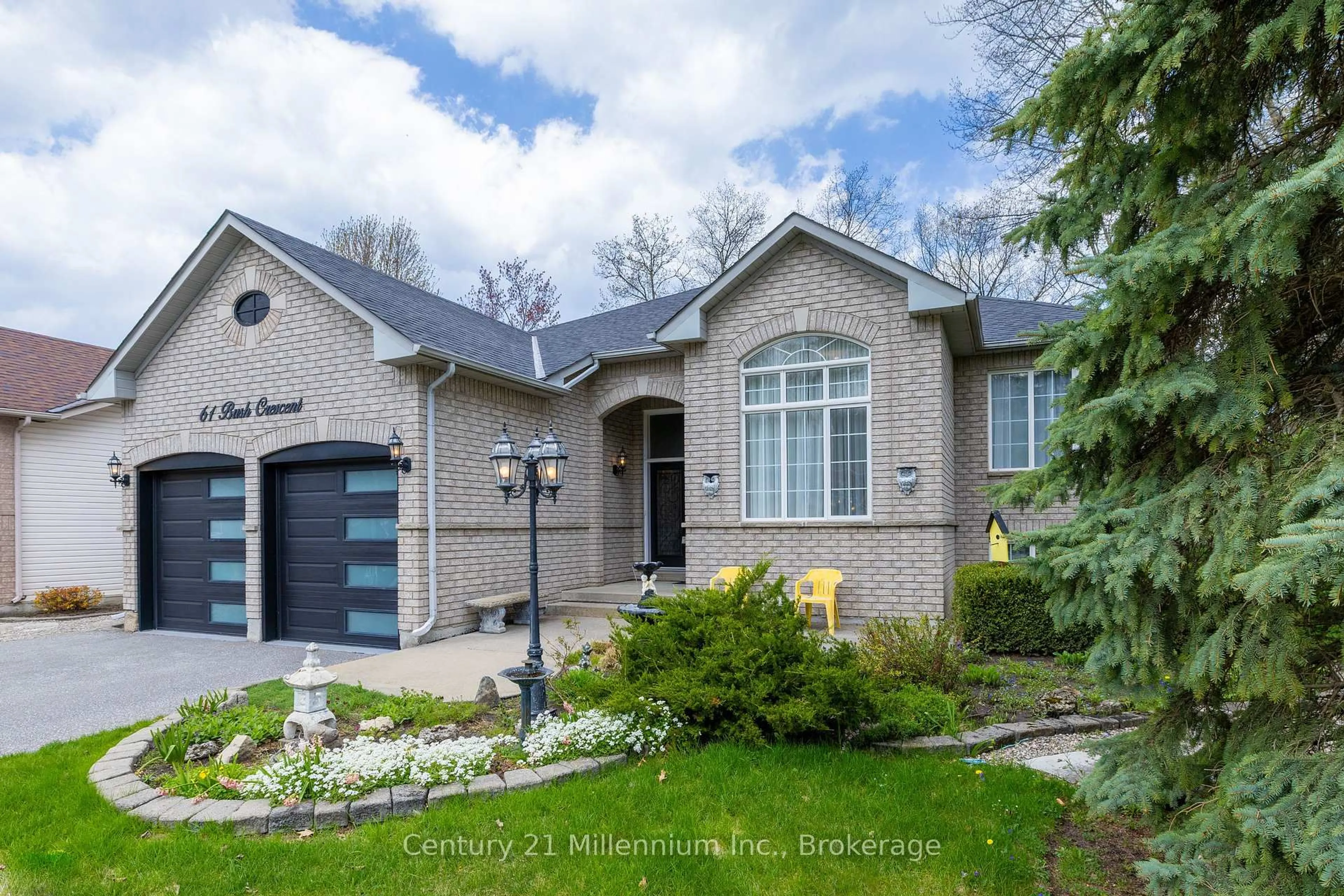 Home with brick exterior material, street for 61 Bush Cres, Wasaga Beach Ontario L9Z 1N1