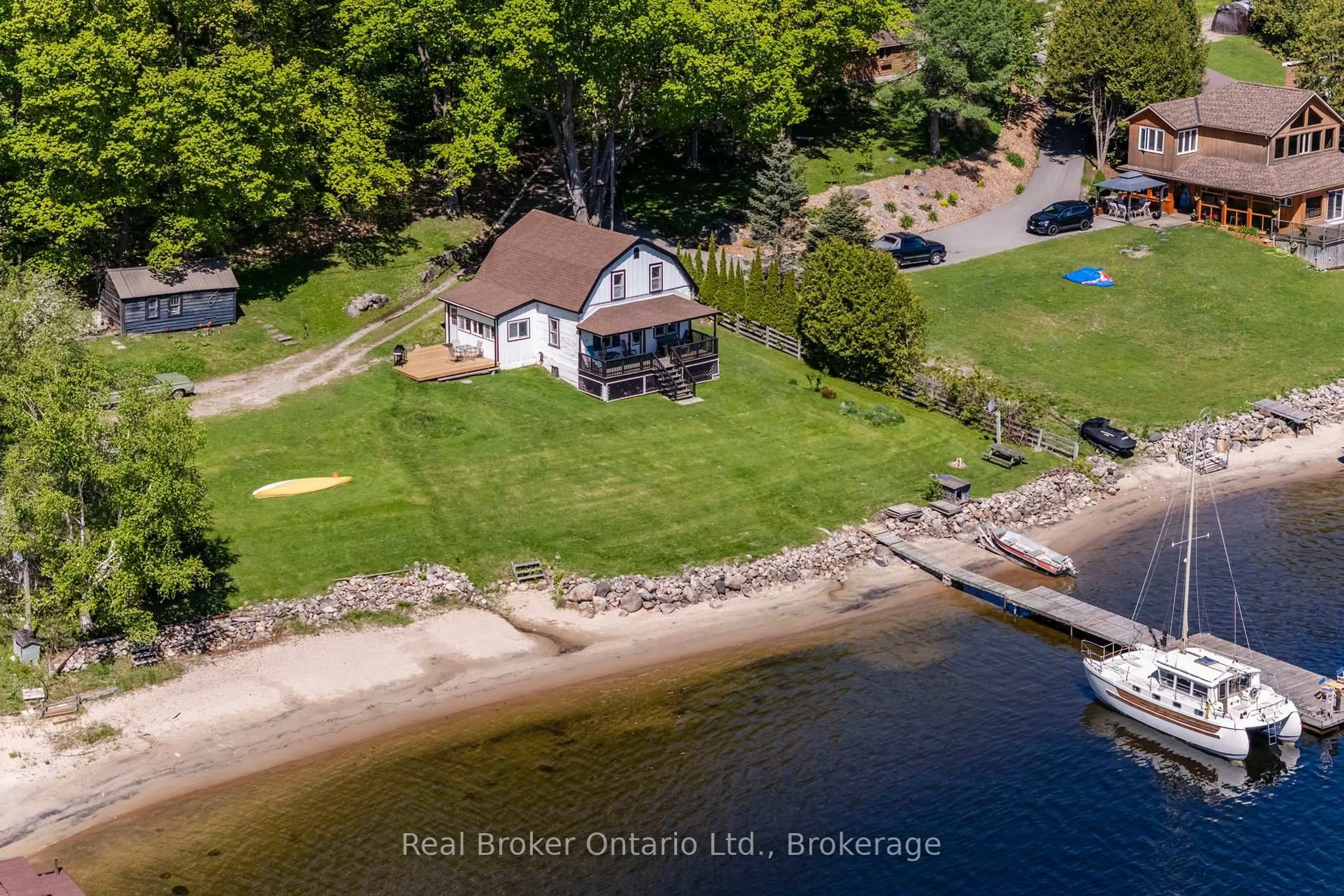 A pic from outside/outdoor area/front of a property/back of a property/a pic from drone, water/lake/river/ocean view for 437 Champlain Rd, Penetanguishene Ontario L9M 1S5