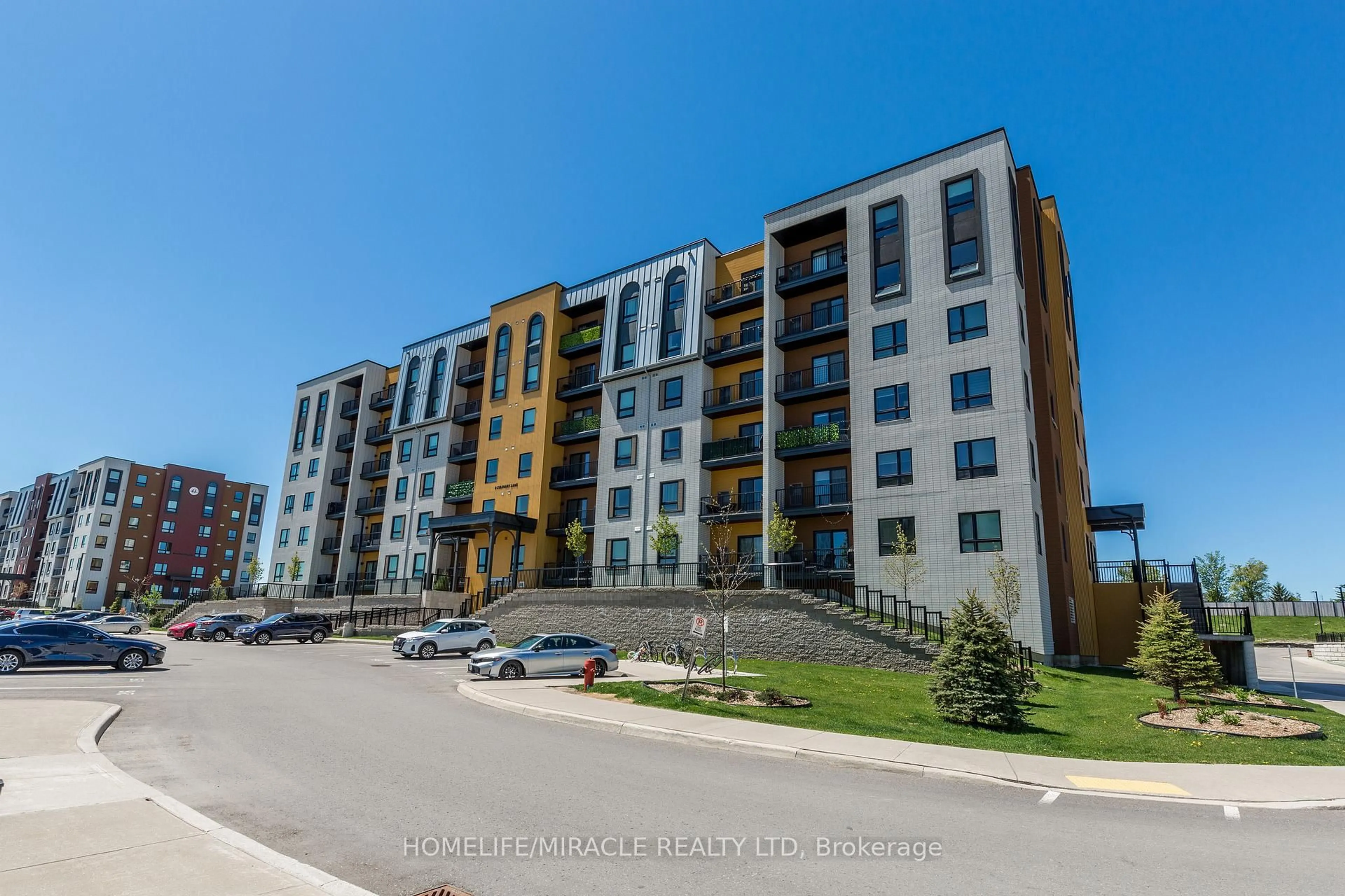 A pic from outside/outdoor area/front of a property/back of a property/a pic from drone, street for 8 Culinary Lane #207, Barrie Ontario L9J 0T2