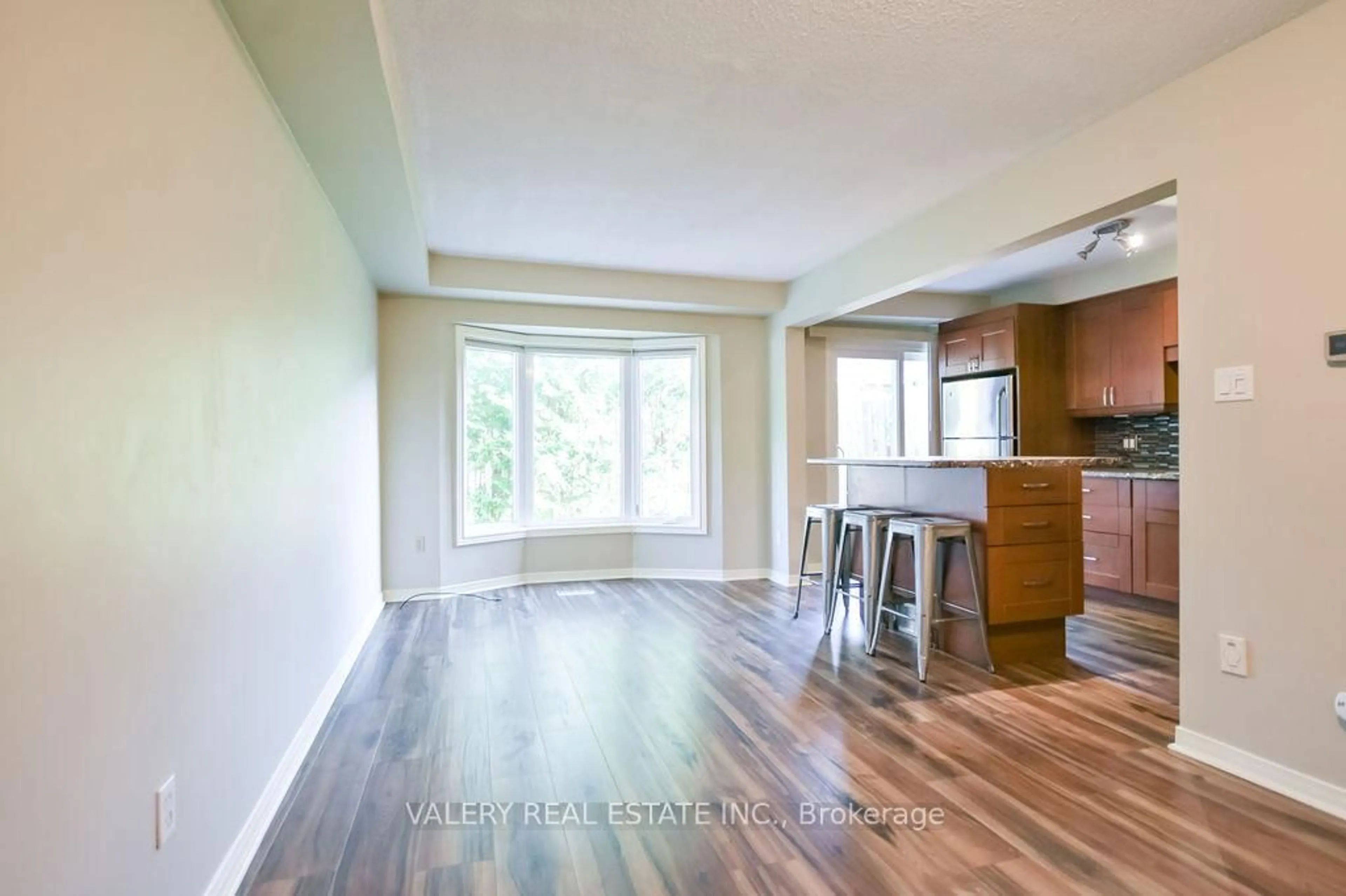 Open concept kitchen, wood/laminate floor for 492 Laclie St #14, Orillia Ontario L3V 7V2