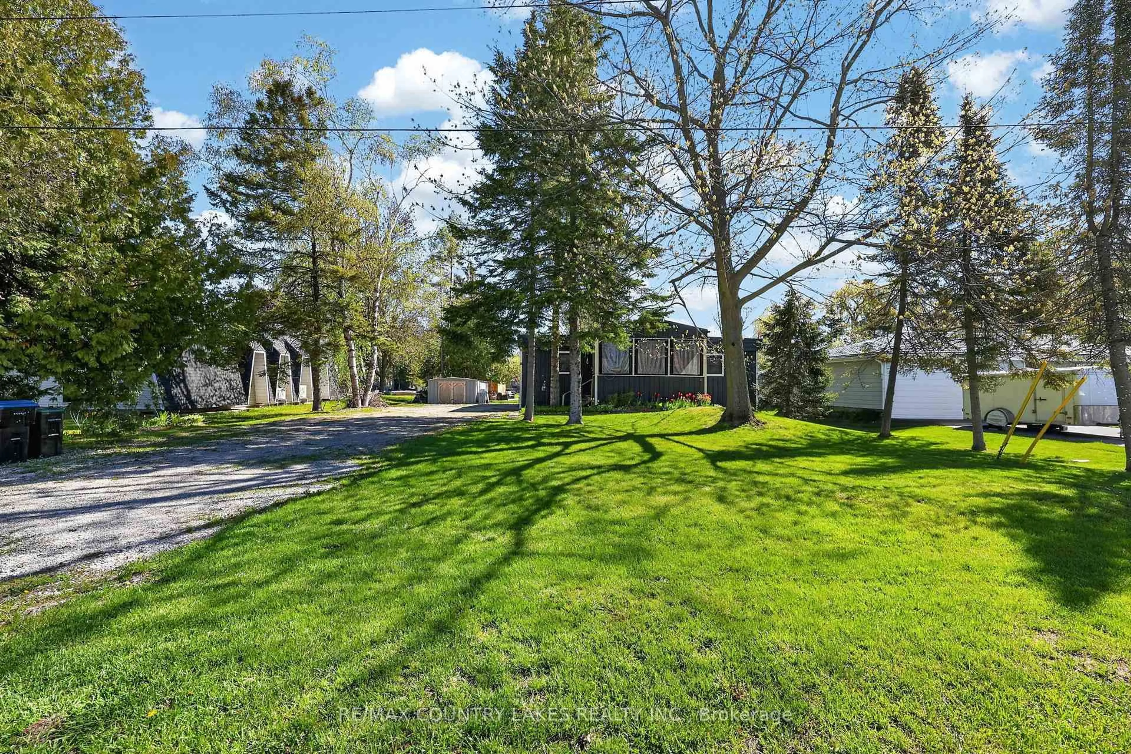 A pic from outside/outdoor area/front of a property/back of a property/a pic from drone, unknown for 19 Poplar Cres, Ramara Ontario L0K 1B0