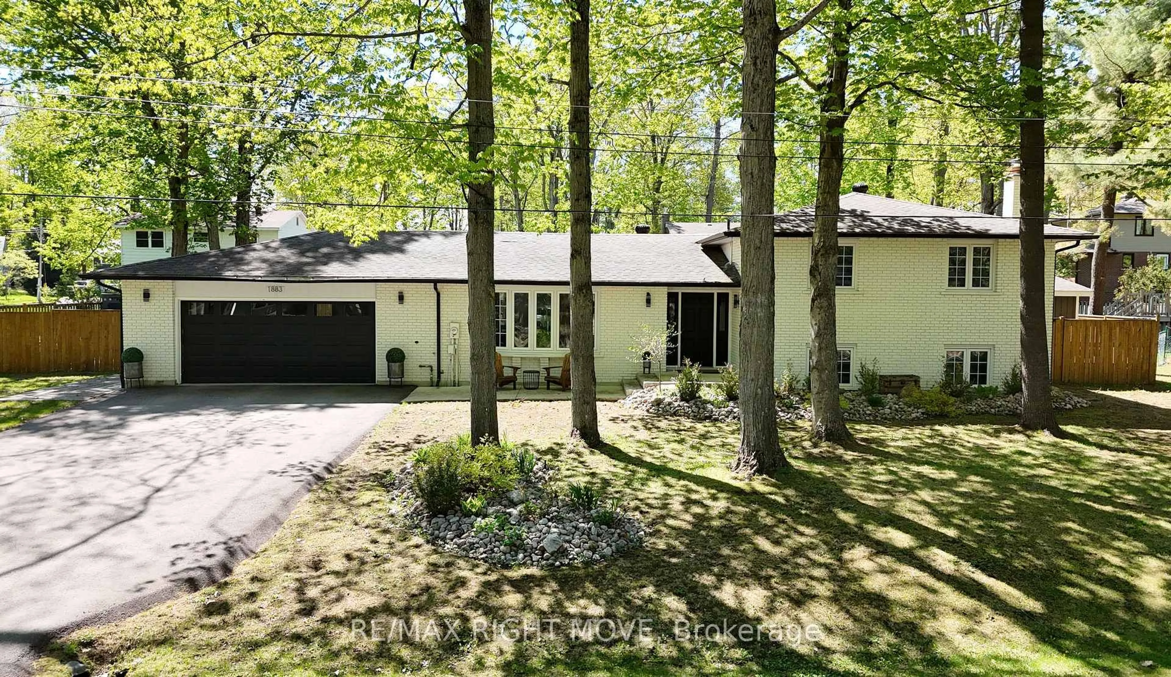 A pic from outside/outdoor area/front of a property/back of a property/a pic from drone, forest/trees view for 1883 Glen Oak Lane, Severn Ontario L3V 7J1