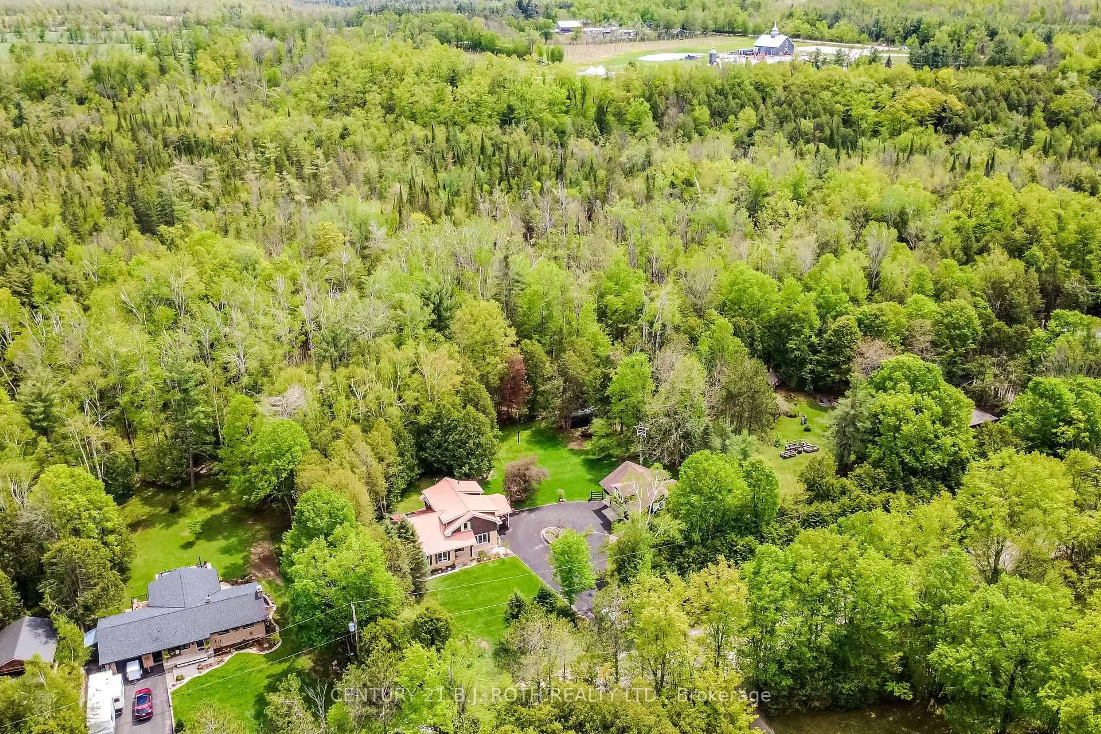 A pic from outside/outdoor area/front of a property/back of a property/a pic from drone, forest/trees view for 1629 Mt. St. Louis Rd, Oro-Medonte Ontario L0K 1E0