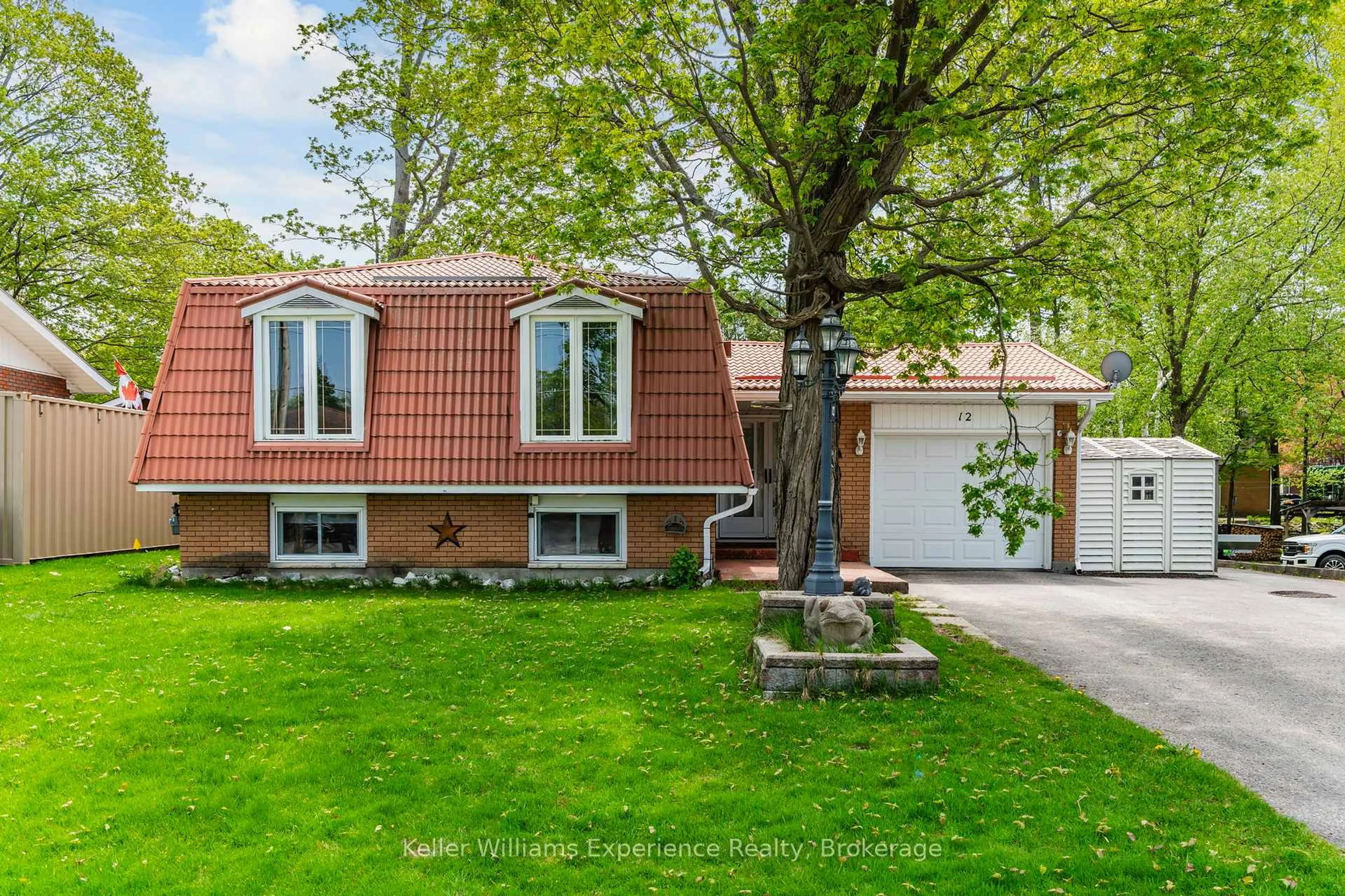 Home with vinyl exterior material, street for 12 Richelieu St, Penetanguishene Ontario L9M 1H9