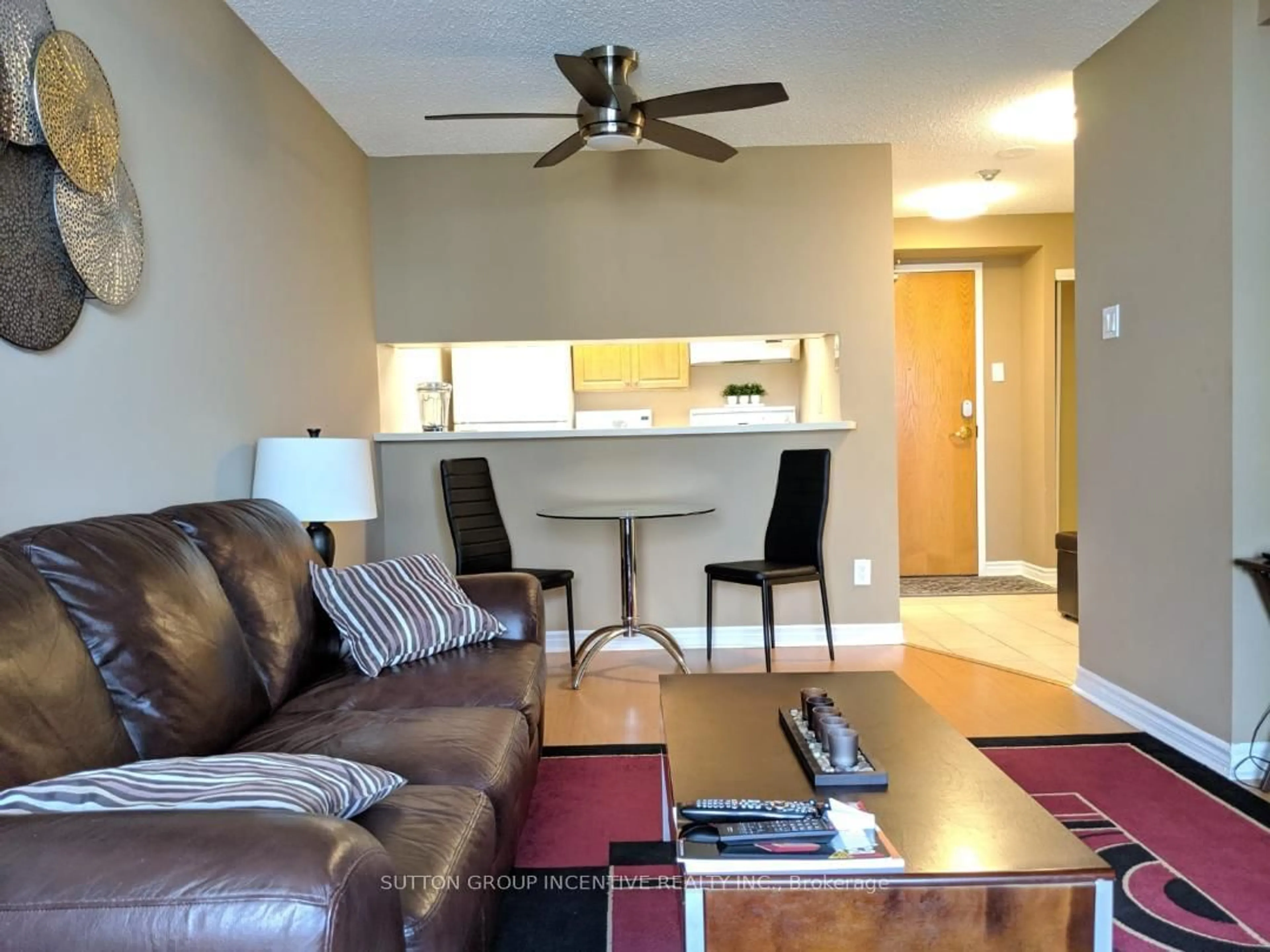 Living room with furniture, unknown for 75 Ellen St #905, Barrie Ontario L4N 7R6