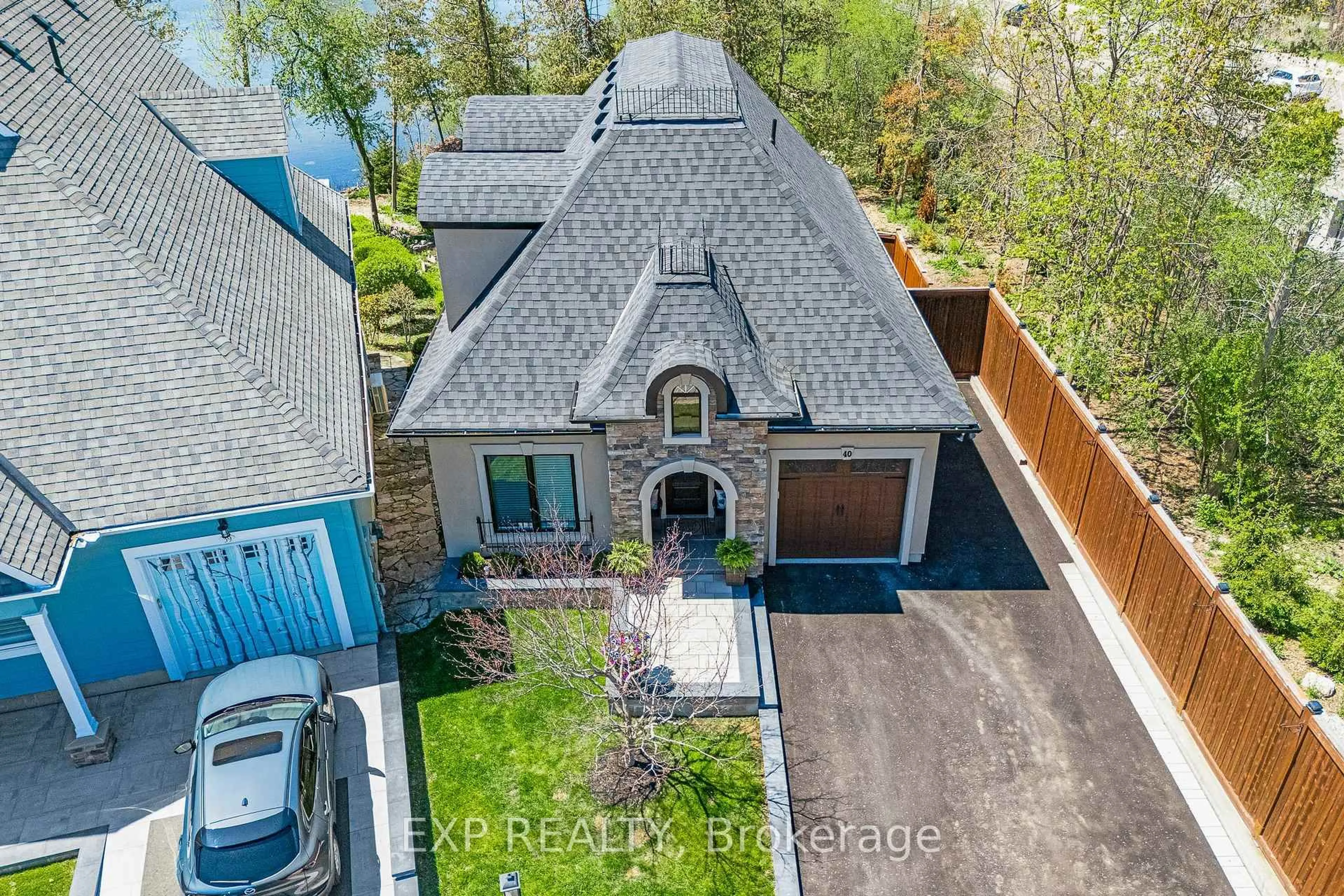A pic from outside/outdoor area/front of a property/back of a property/a pic from drone, water/lake/river/ocean view for 5 Invermara Crt #40, Orillia Ontario L3V 8B4