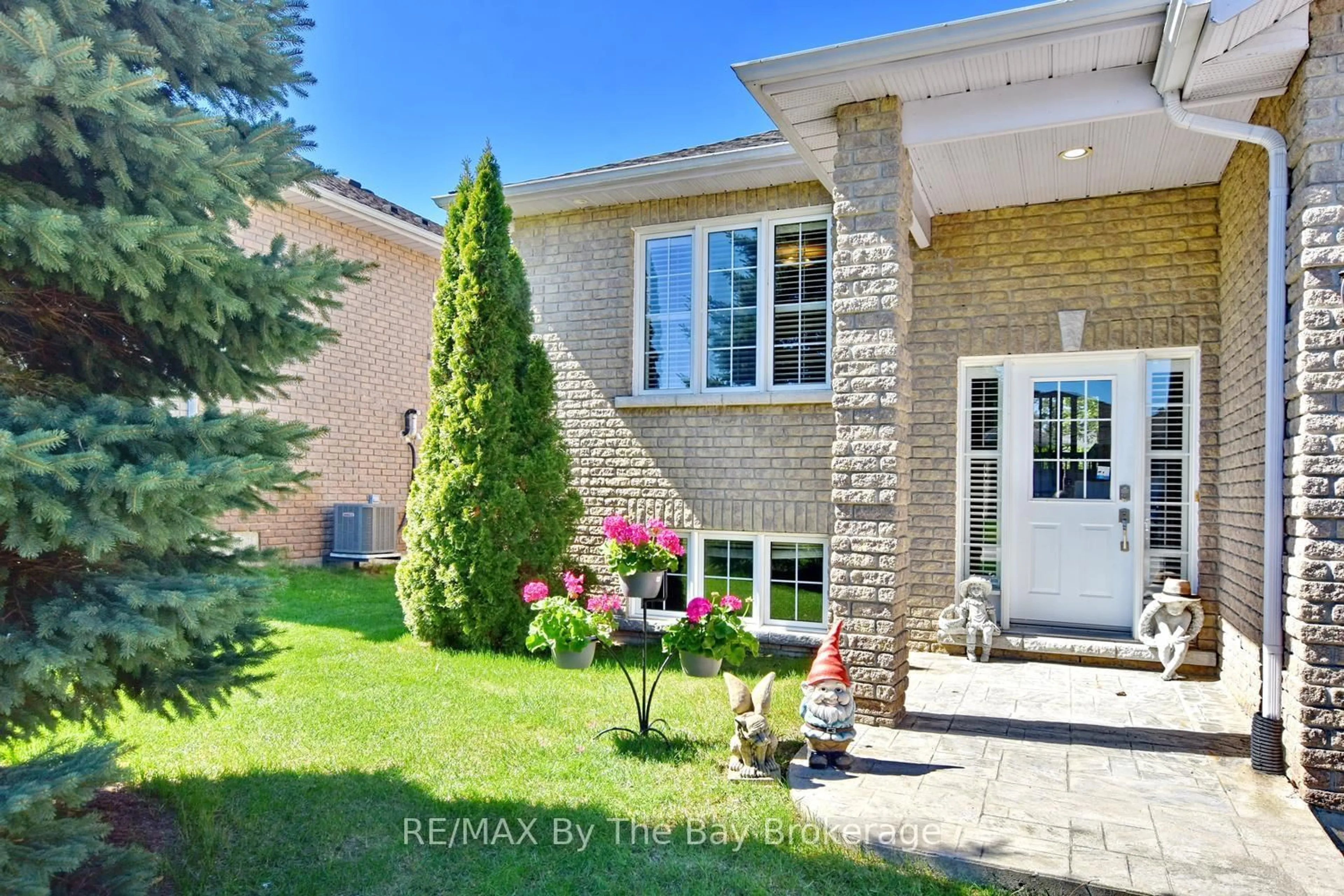 Home with brick exterior material, street for 4 Anthony St, Wasaga Beach Ontario L9Z 2N4