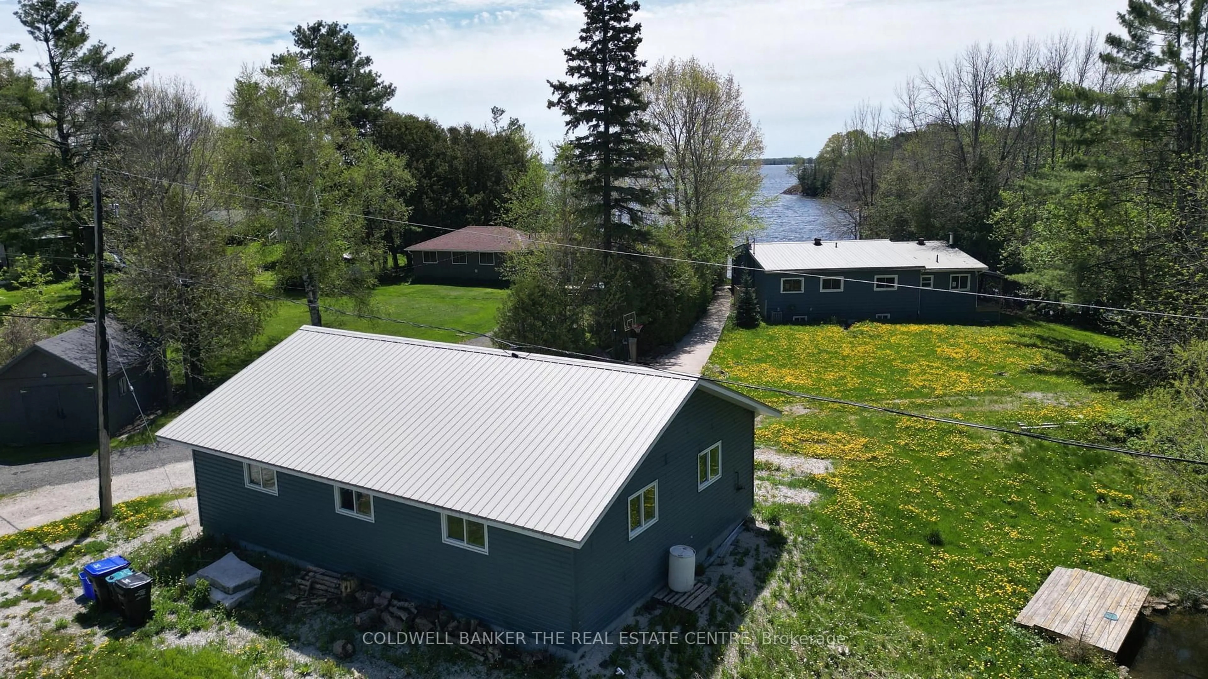A pic from outside/outdoor area/front of a property/back of a property/a pic from drone, water/lake/river/ocean view for 3637 SOUTHWOOD BEACH Blvd, Ramara Ontario L0K 2B0