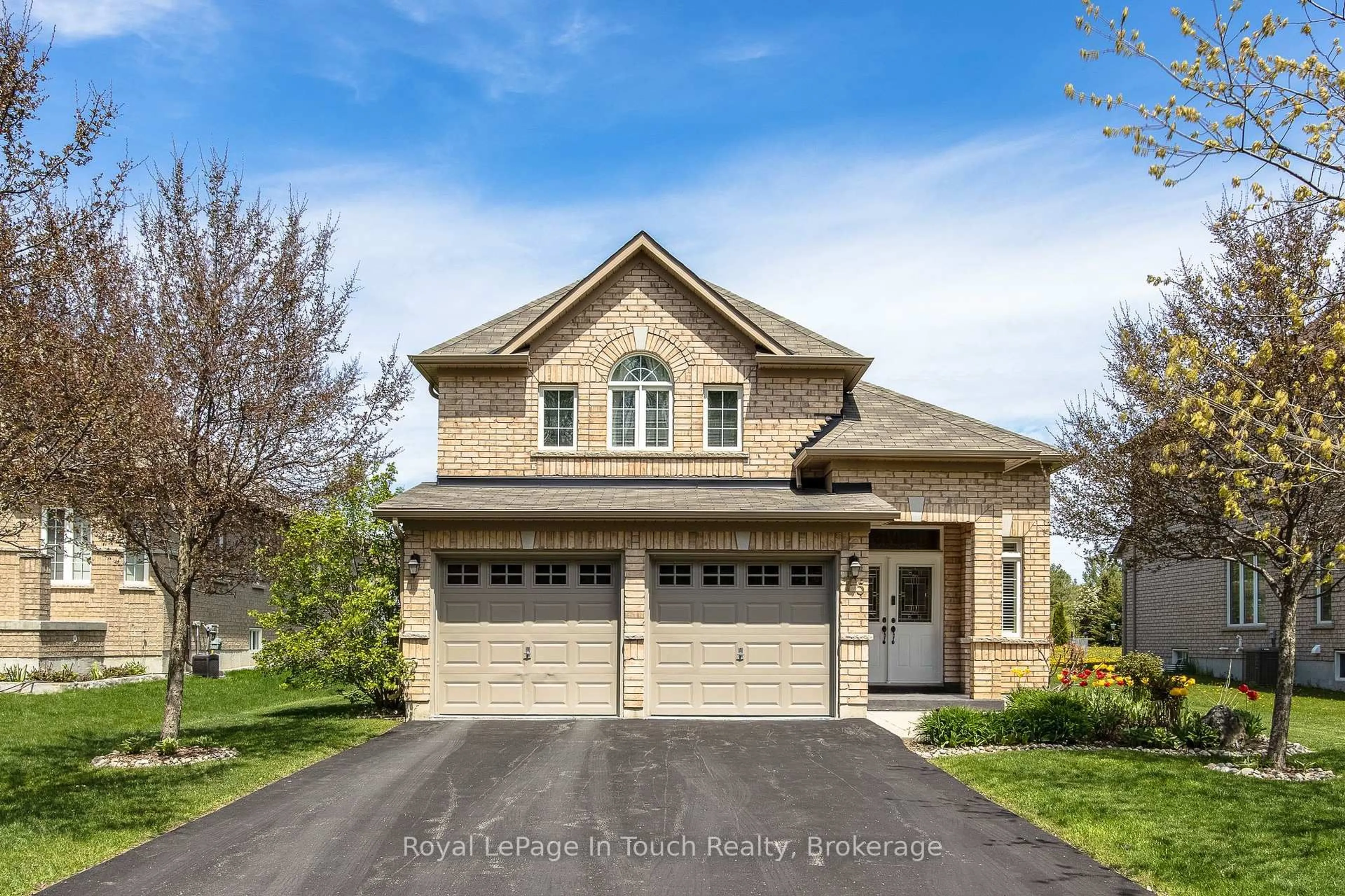 Home with brick exterior material, street for 75 Pearl St, Wasaga Beach Ontario L9Z 0G8
