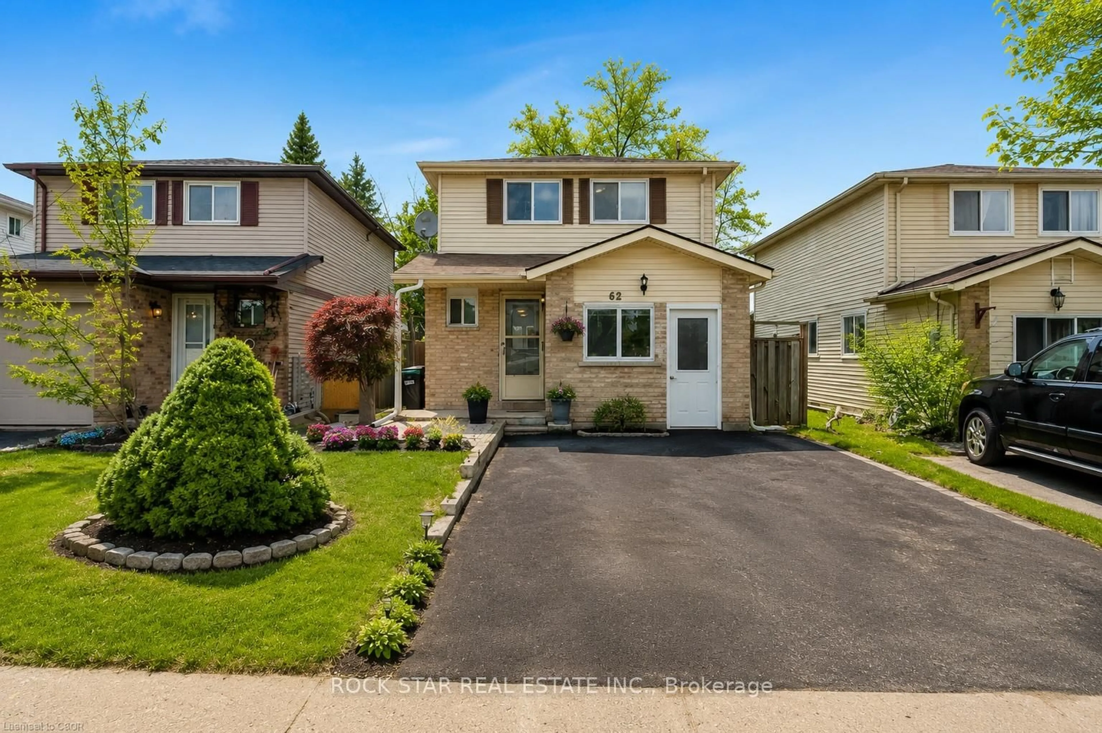 Home with vinyl exterior material, street for 62 Corbett Dr, Barrie Ontario L4M 5V2