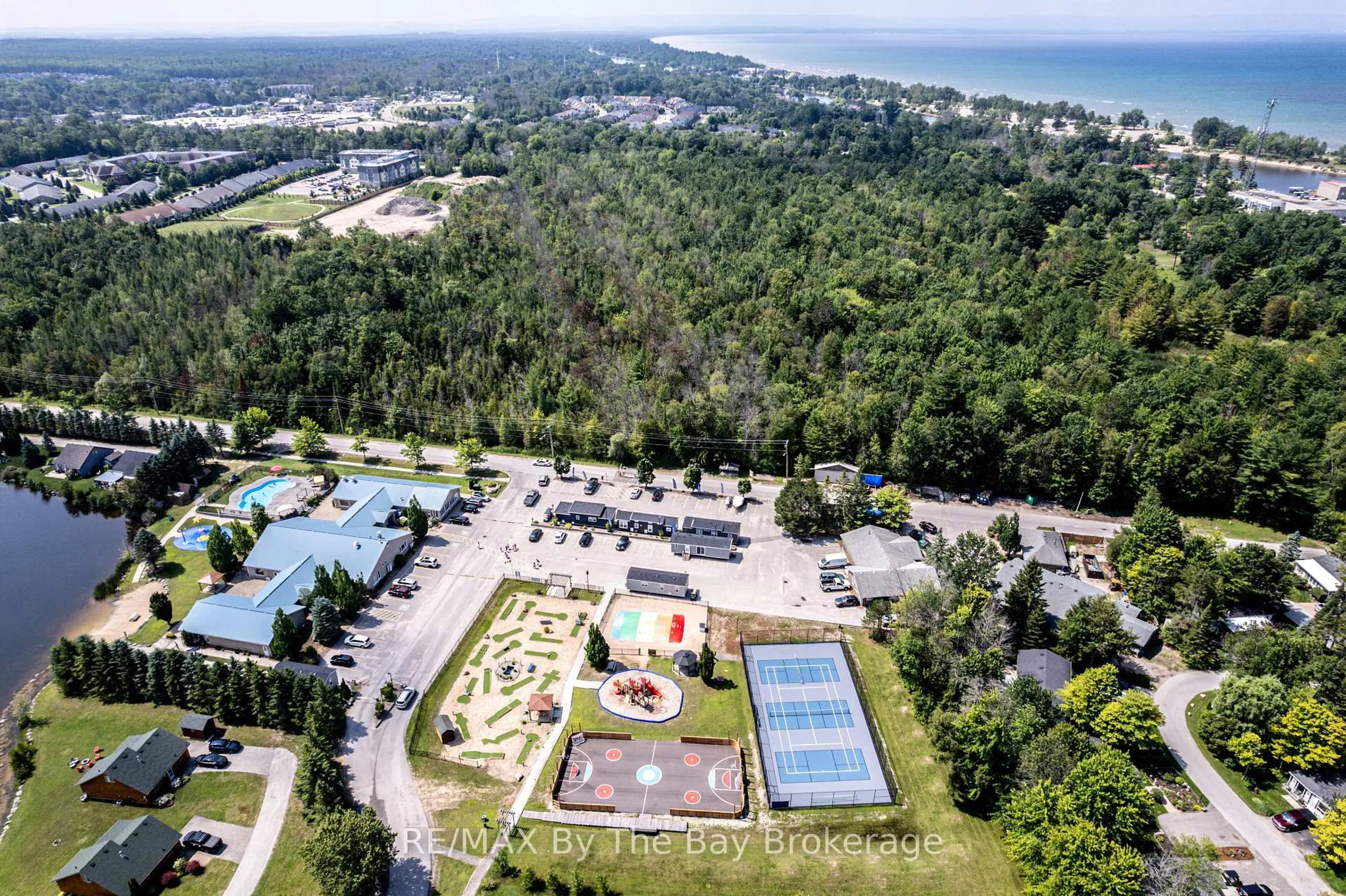 A pic from outside/outdoor area/front of a property/back of a property/a pic from drone, water/lake/river/ocean view for 14 KENORA Tr, Wasaga Beach Ontario L9Z 1X7