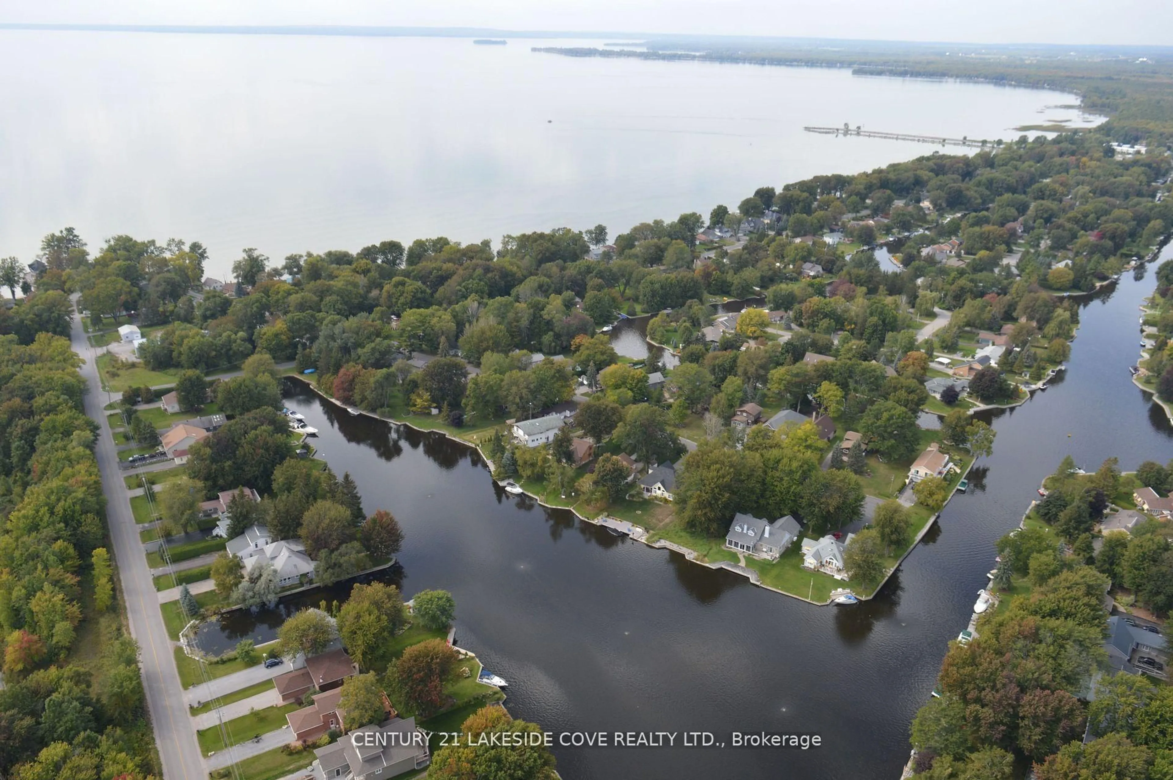 A pic from outside/outdoor area/front of a property/back of a property/a pic from drone, water/lake/river/ocean view for 51 Ridge Ave, Ramara Ontario L0K 1B0