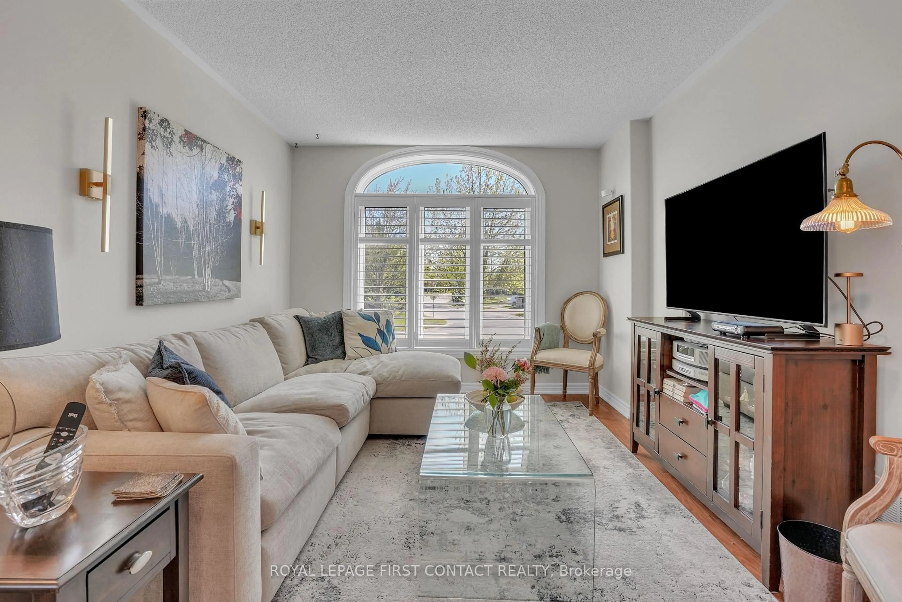 Living room with furniture, ceramic/tile floor for 163 Emms Dr, Barrie Ontario L4N 9N7