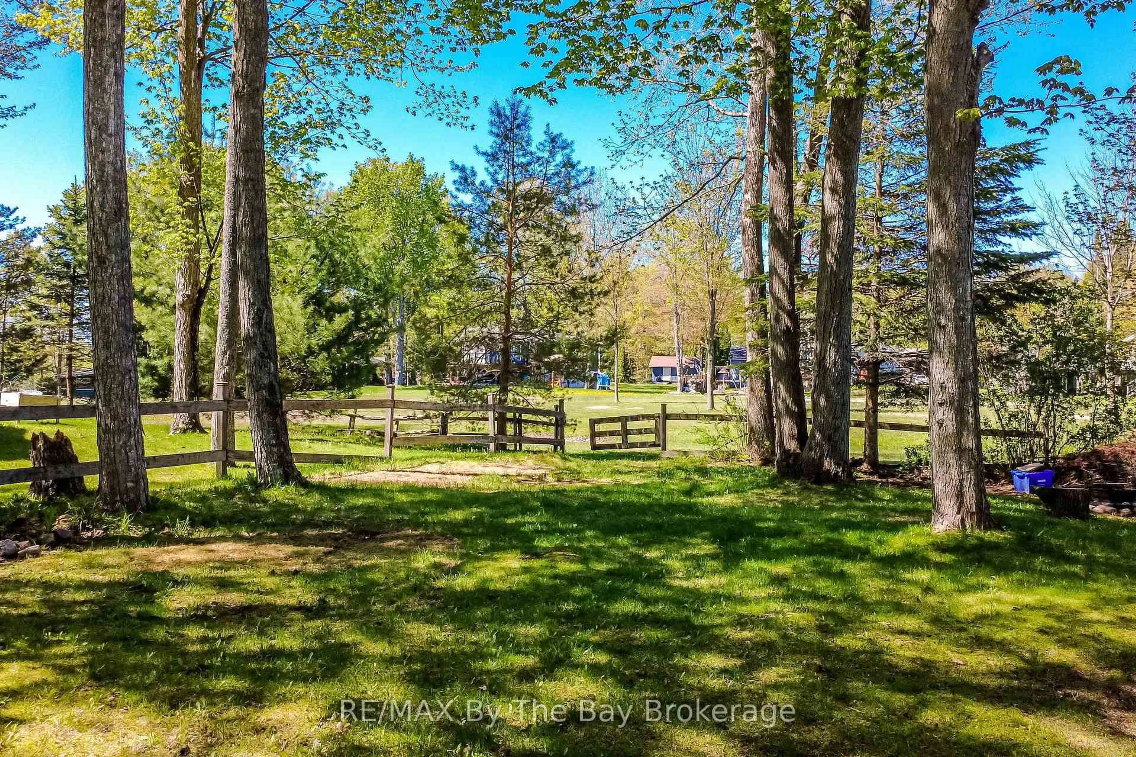 A pic from outside/outdoor area/front of a property/back of a property/a pic from drone, forest/trees view for 22 Talon Tr, Tiny Ontario L9M 0E1
