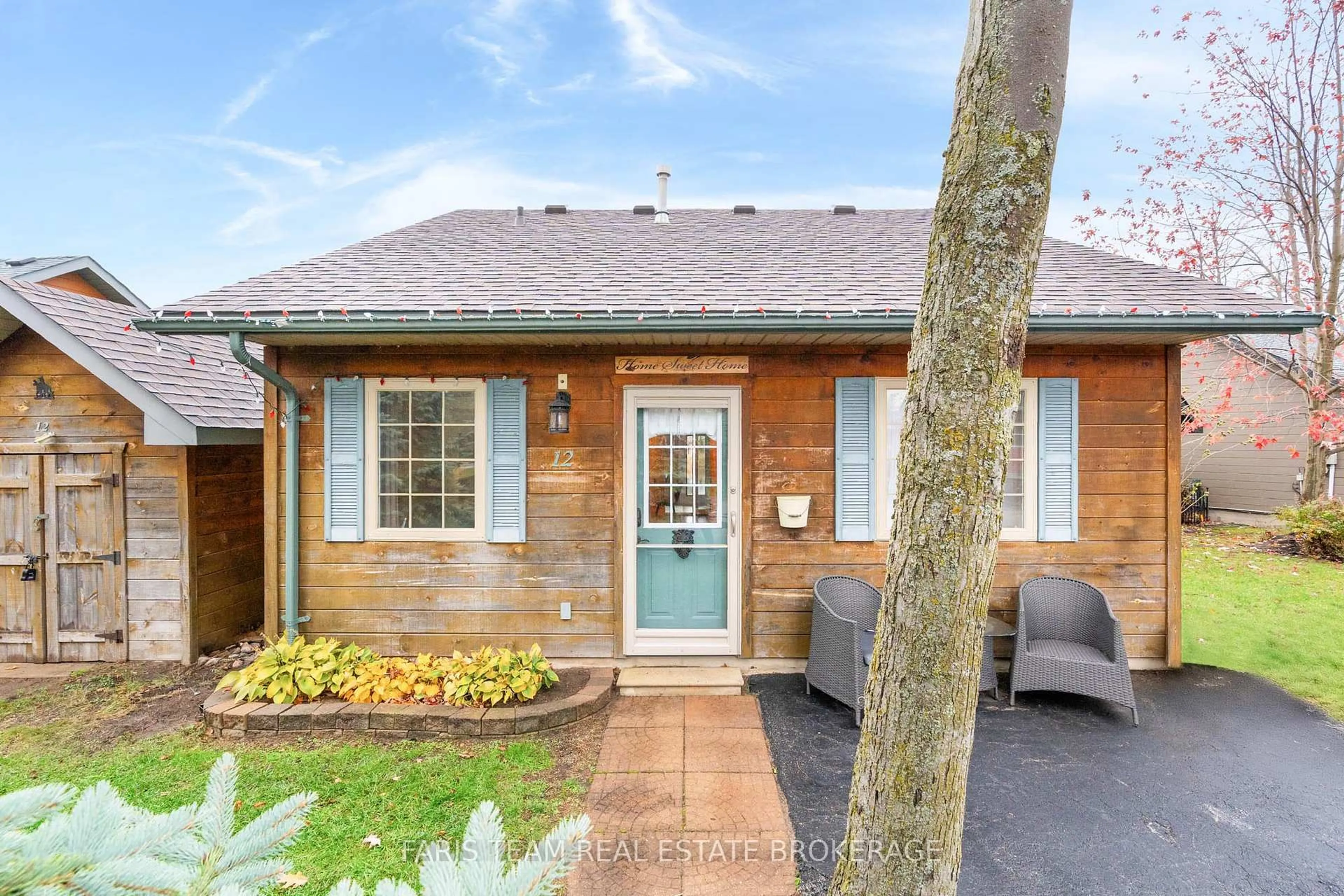Home with brick exterior material, street for 12 Cabin Cres, Wasaga Beach Ontario L9Z 1X7