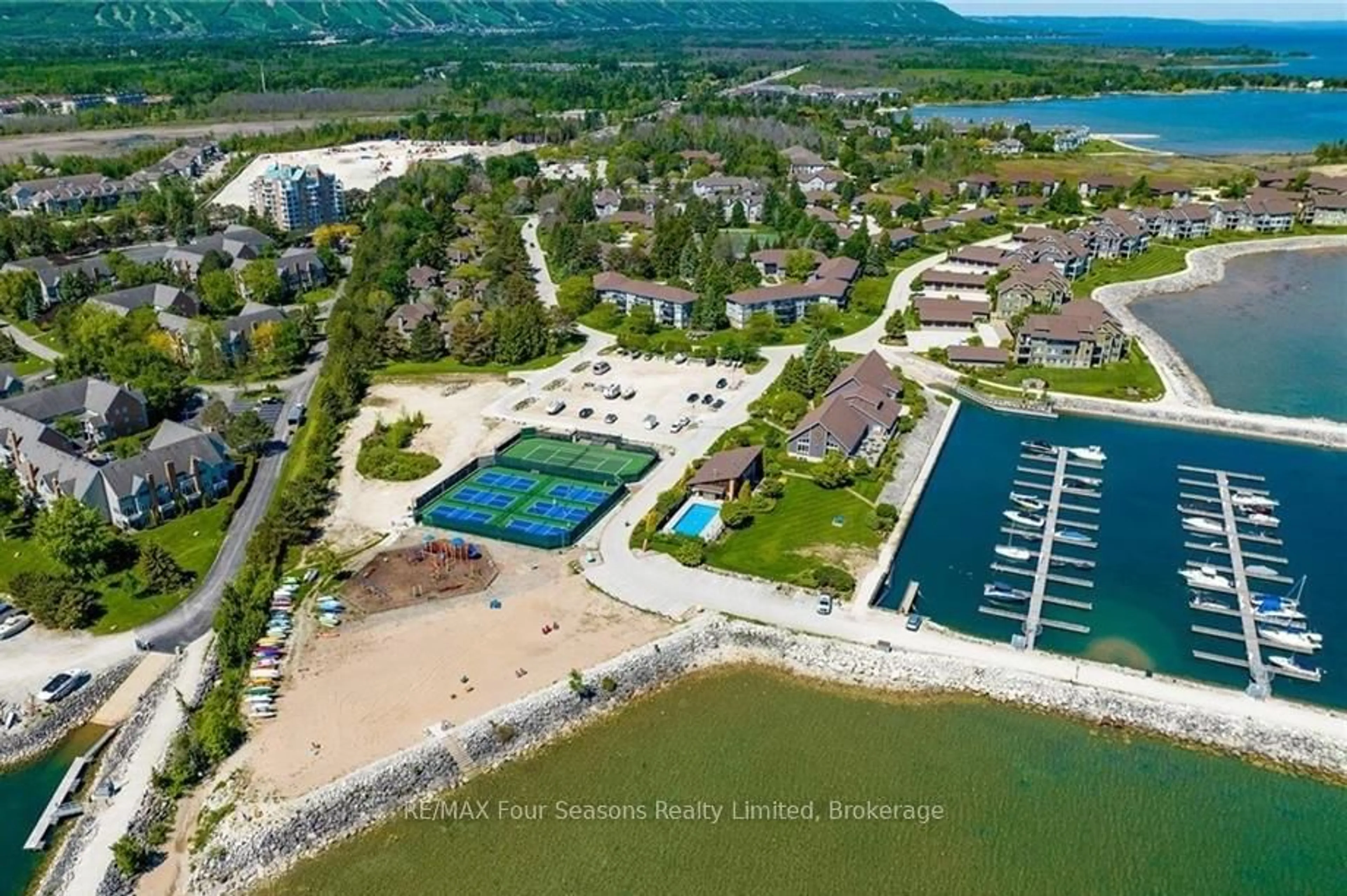 A pic from outside/outdoor area/front of a property/back of a property/a pic from drone, water/lake/river/ocean view for 373 MARINERS Way, Collingwood Ontario L9Y 5C7