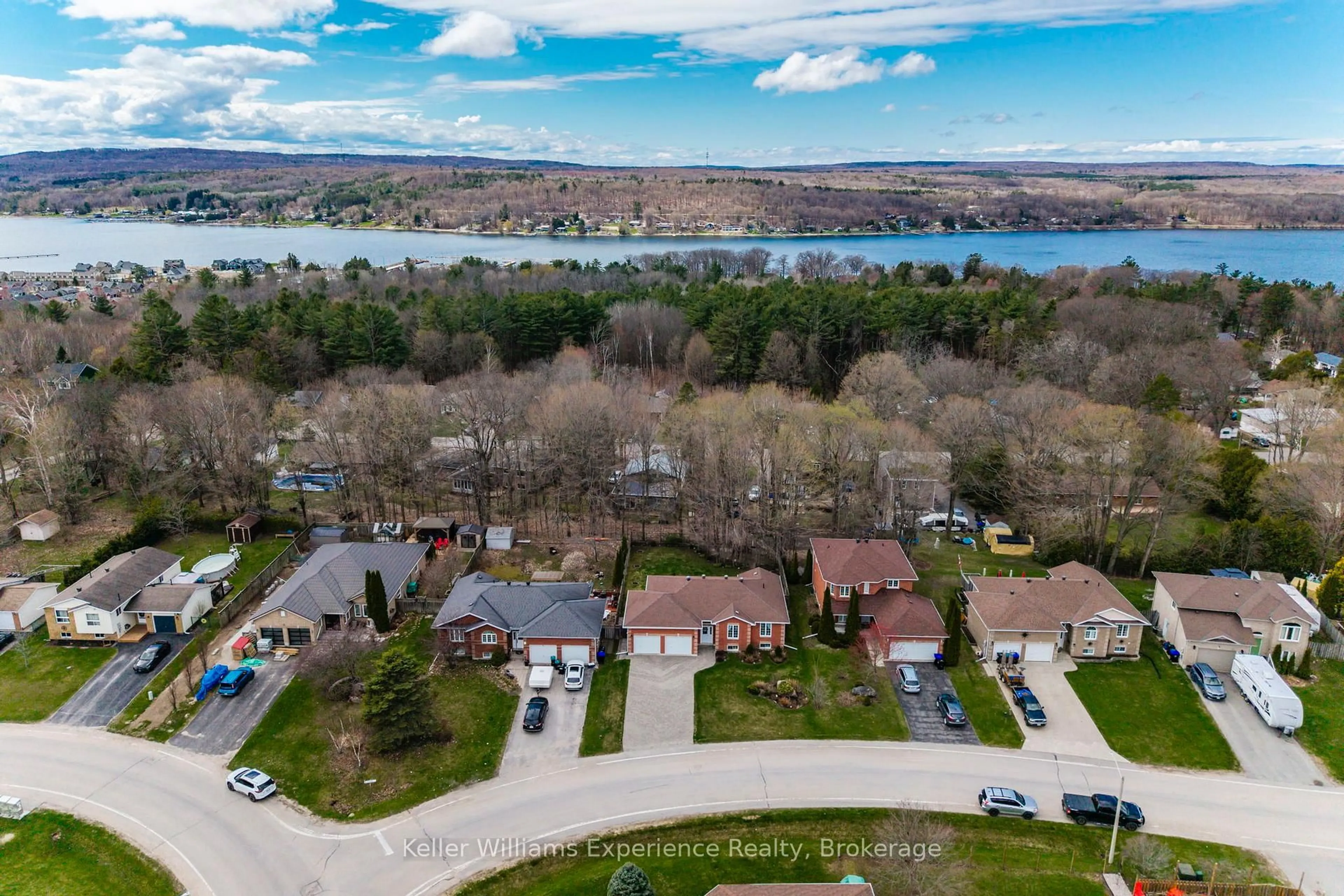 A pic from outside/outdoor area/front of a property/back of a property/a pic from drone, water/lake/river/ocean view for 4 Byrnes Cres, Penetanguishene Ontario L9M 1W4