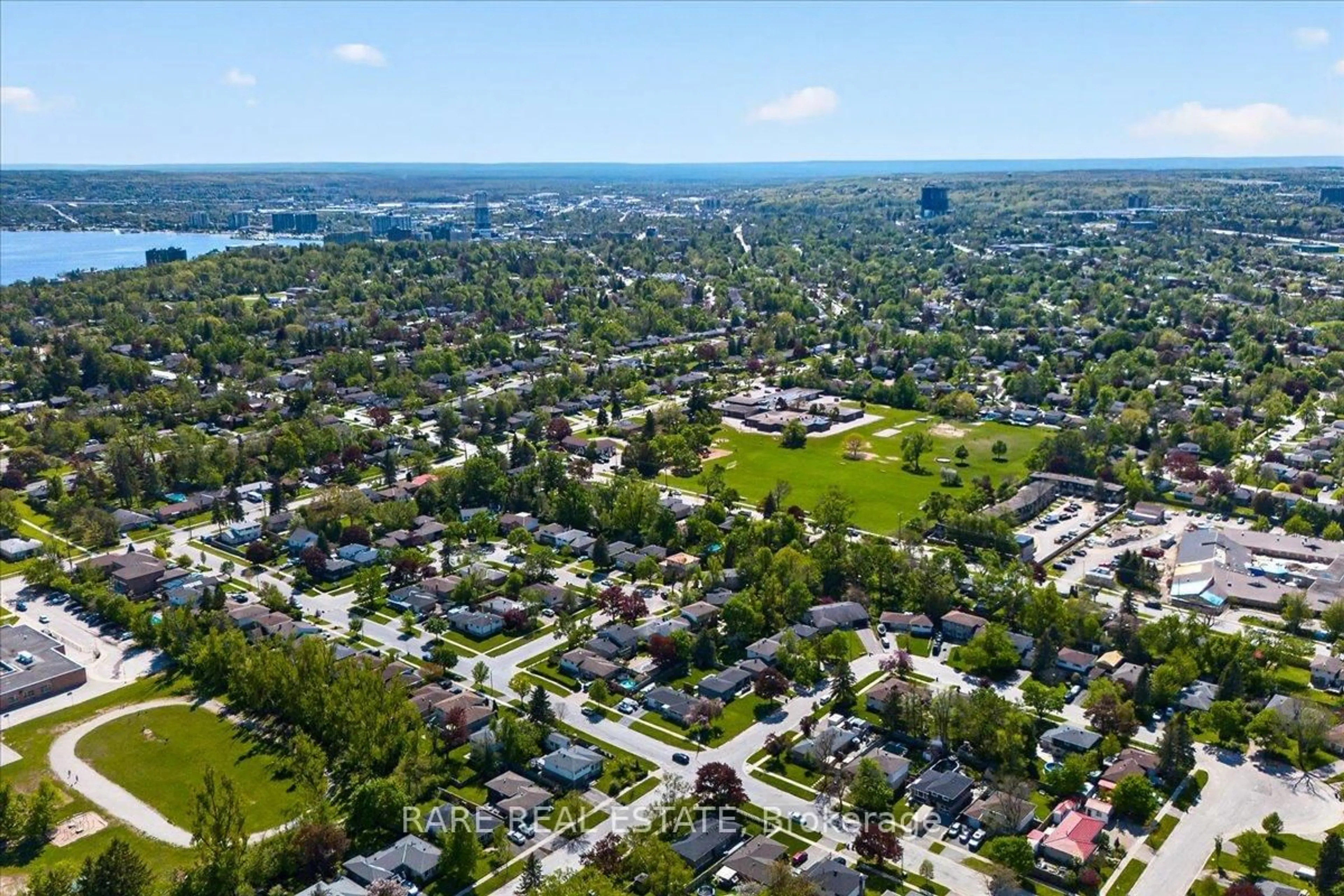 A pic from outside/outdoor area/front of a property/back of a property/a pic from drone, mountain view for 21 Porter Cres, Barrie Ontario L4M 5H8
