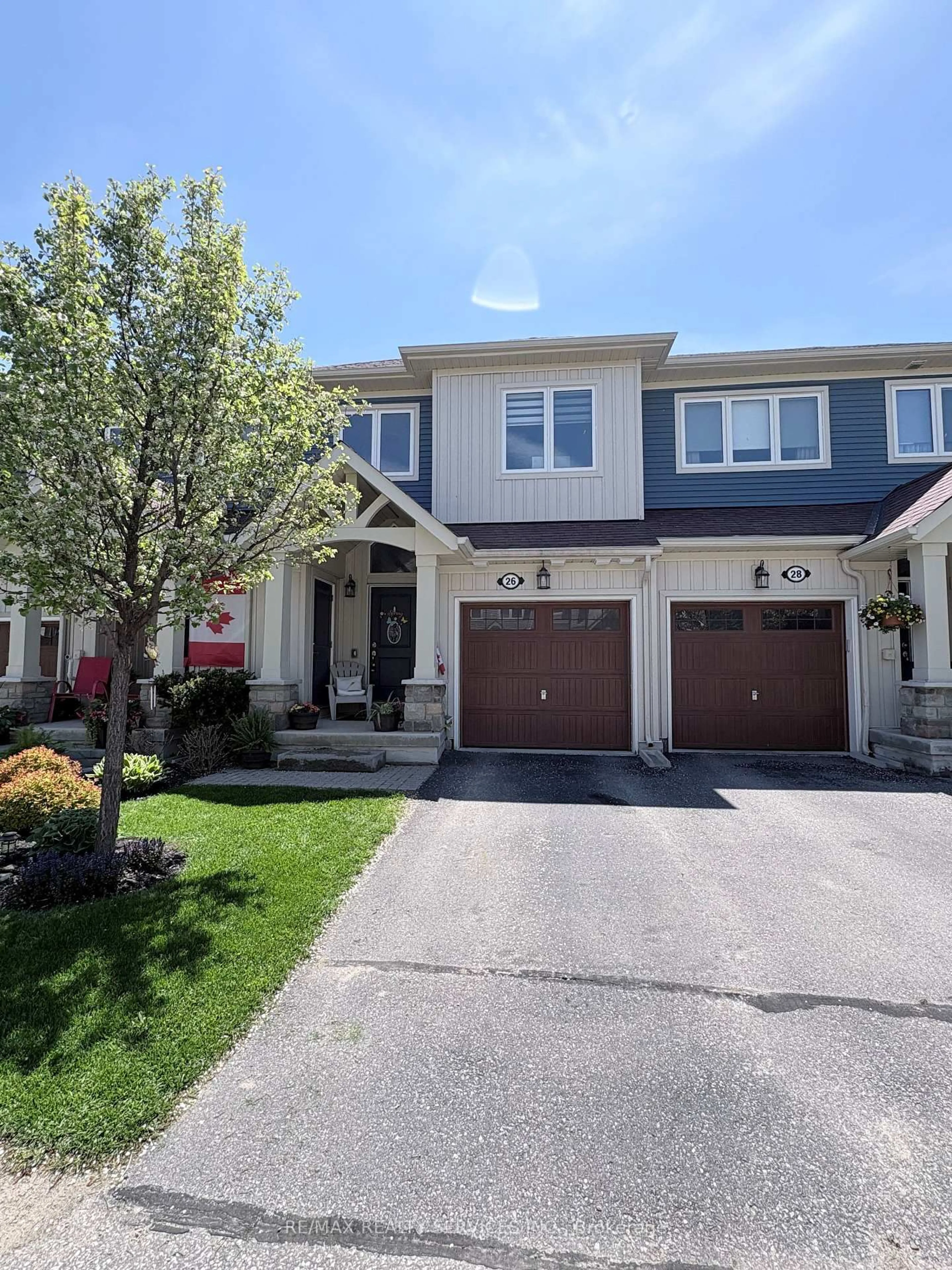 Home with vinyl exterior material, street for 26 Lett Ave, Collingwood Ontario L9Y 0Z5