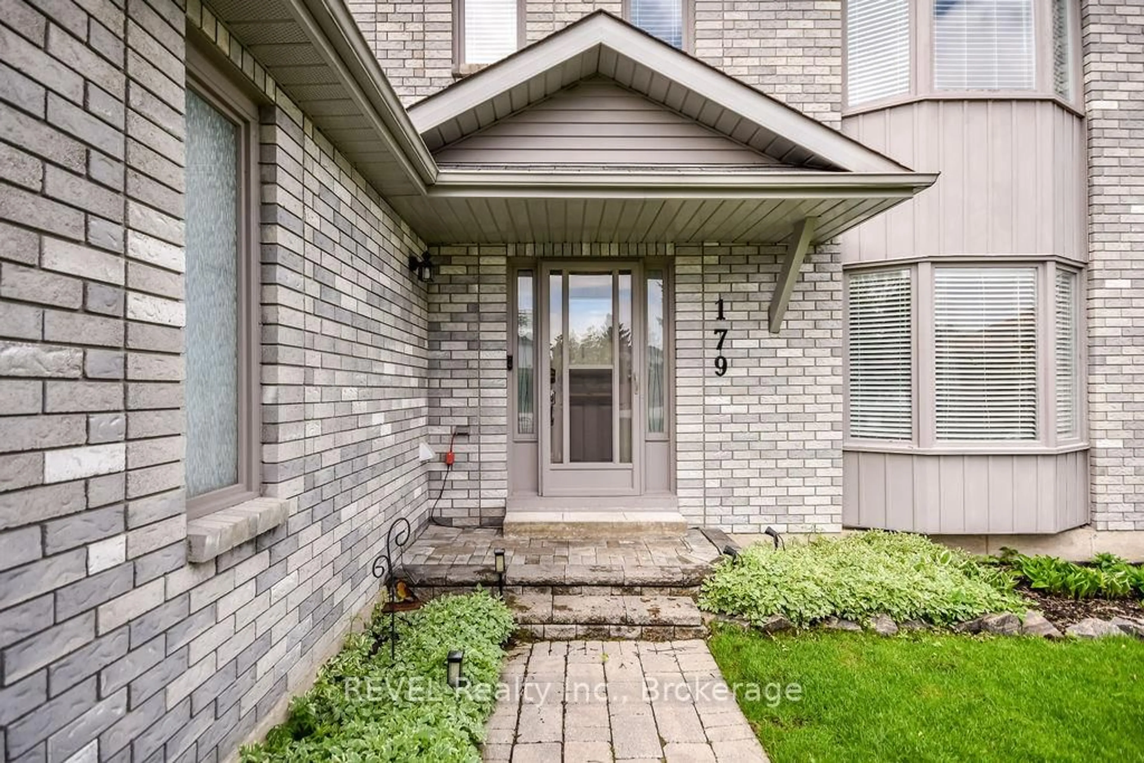 Home with brick exterior material, street for 179 Luckport Cres, Midland Ontario L4R 4Y1