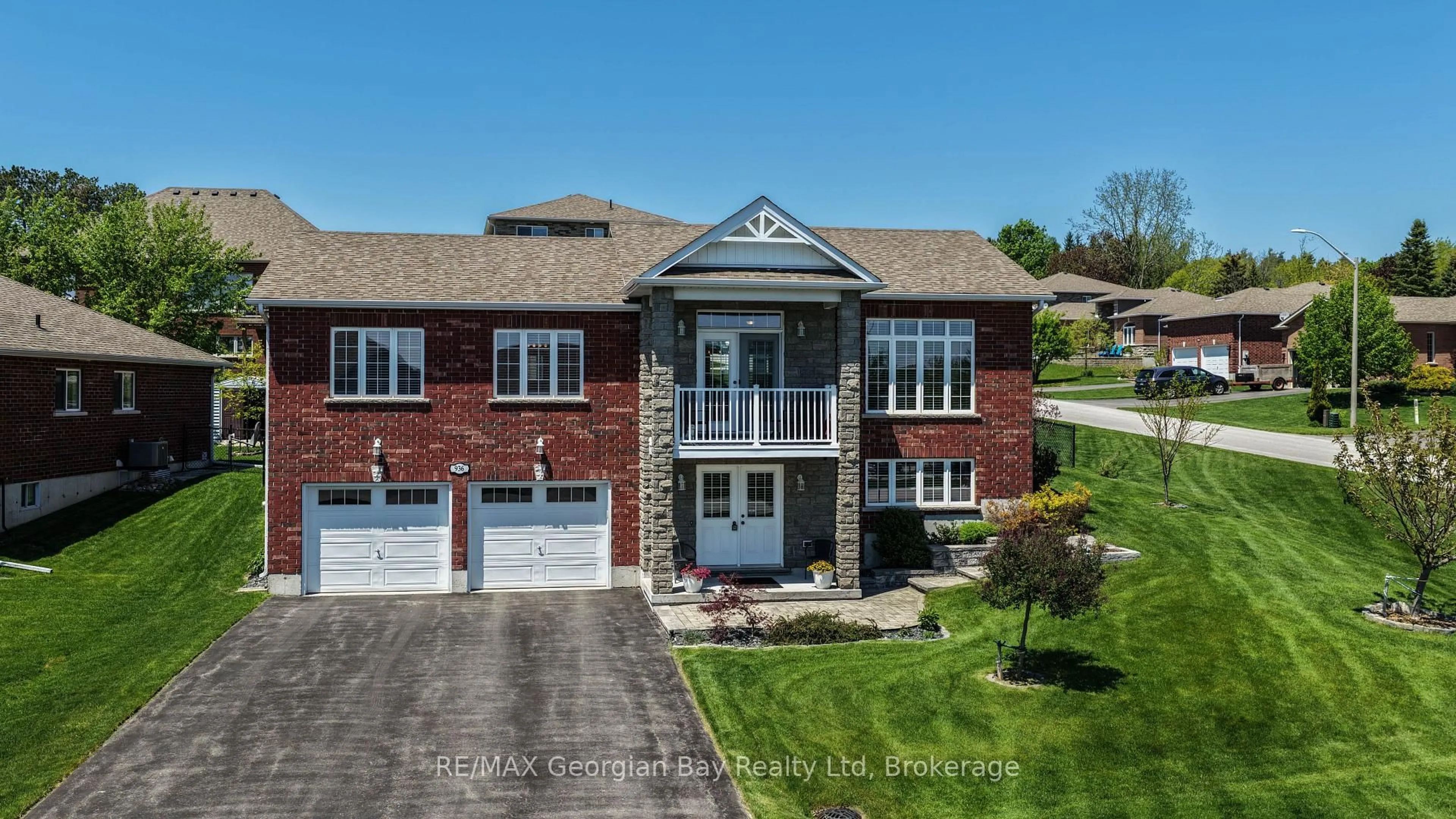 Home with brick exterior material, street for 936 Jordeli Lane, Midland Ontario L4R 0A6