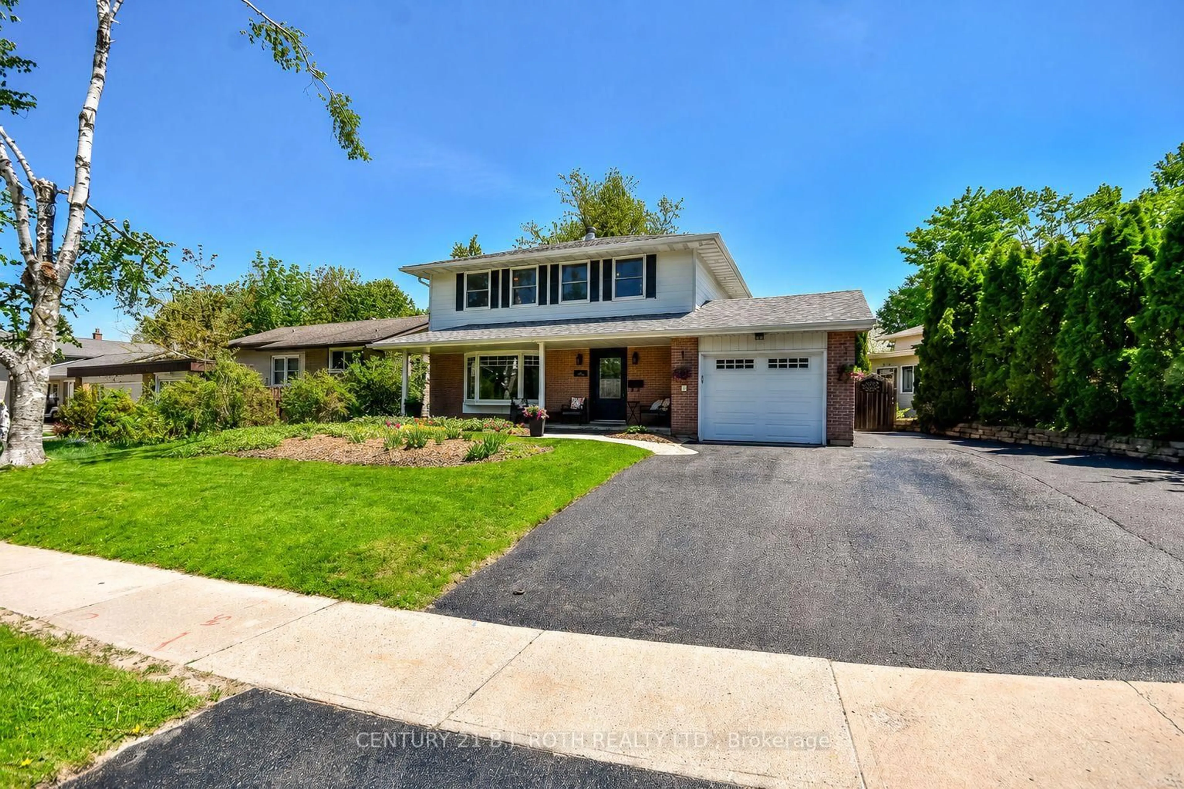 Home with brick exterior material, street for 21 Belcourt Ave, Barrie Ontario L4M 4E2