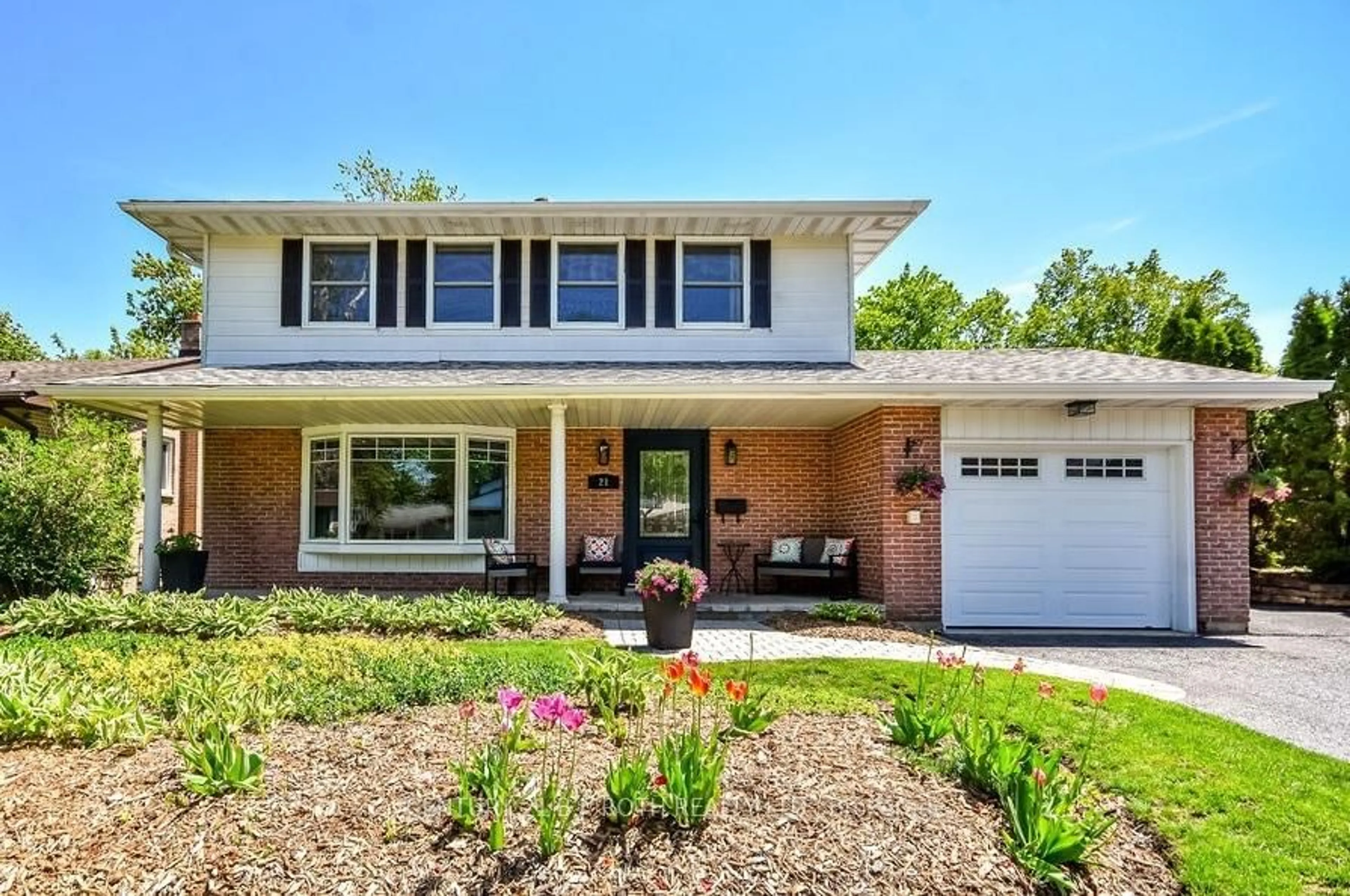 Home with brick exterior material, street for 21 Belcourt Ave, Barrie Ontario L4M 4E2