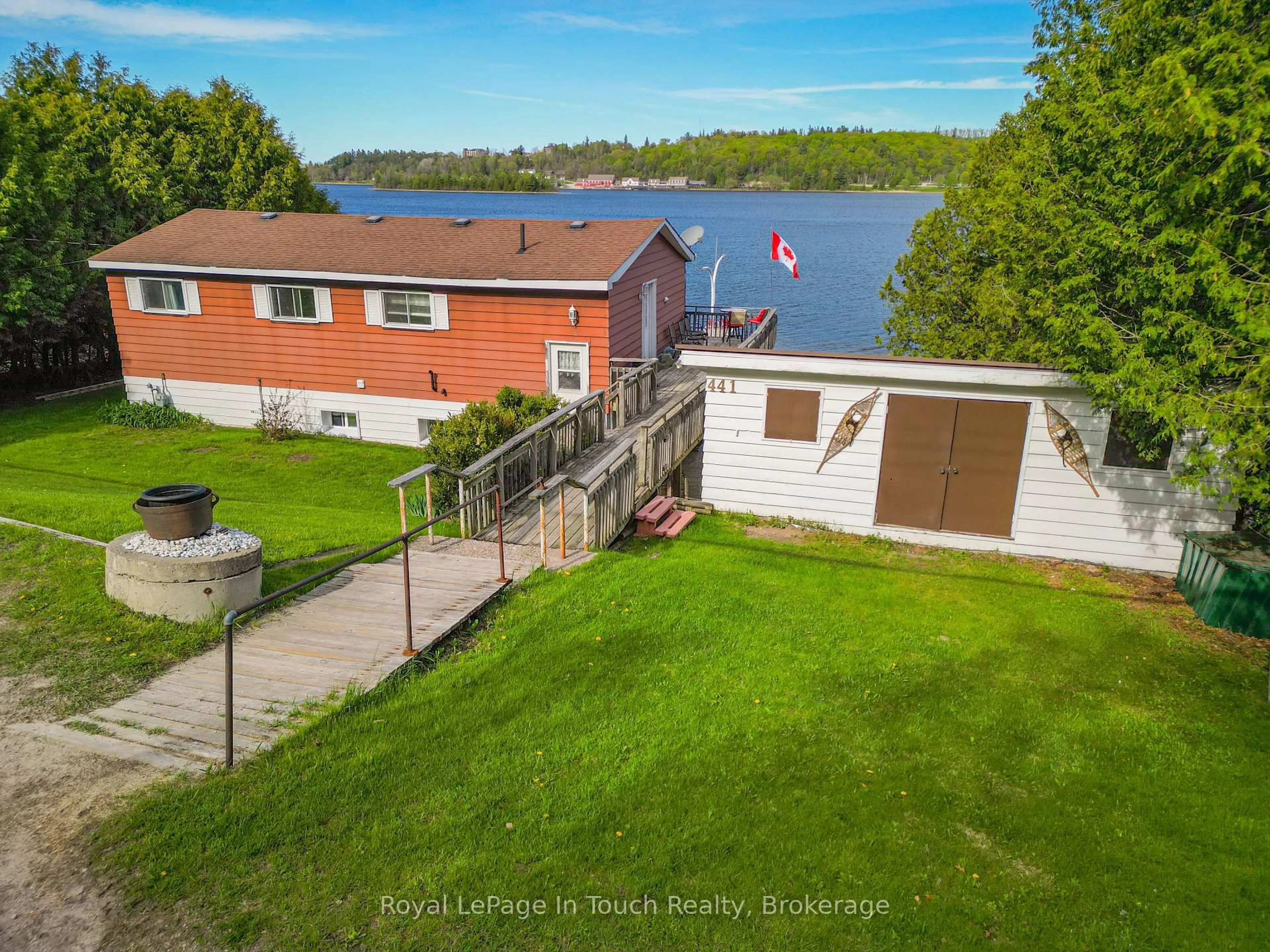 A pic from outside/outdoor area/front of a property/back of a property/a pic from drone, water/lake/river/ocean view for 441 Champlain Rd, Penetanguishene Ontario L9M 1S5