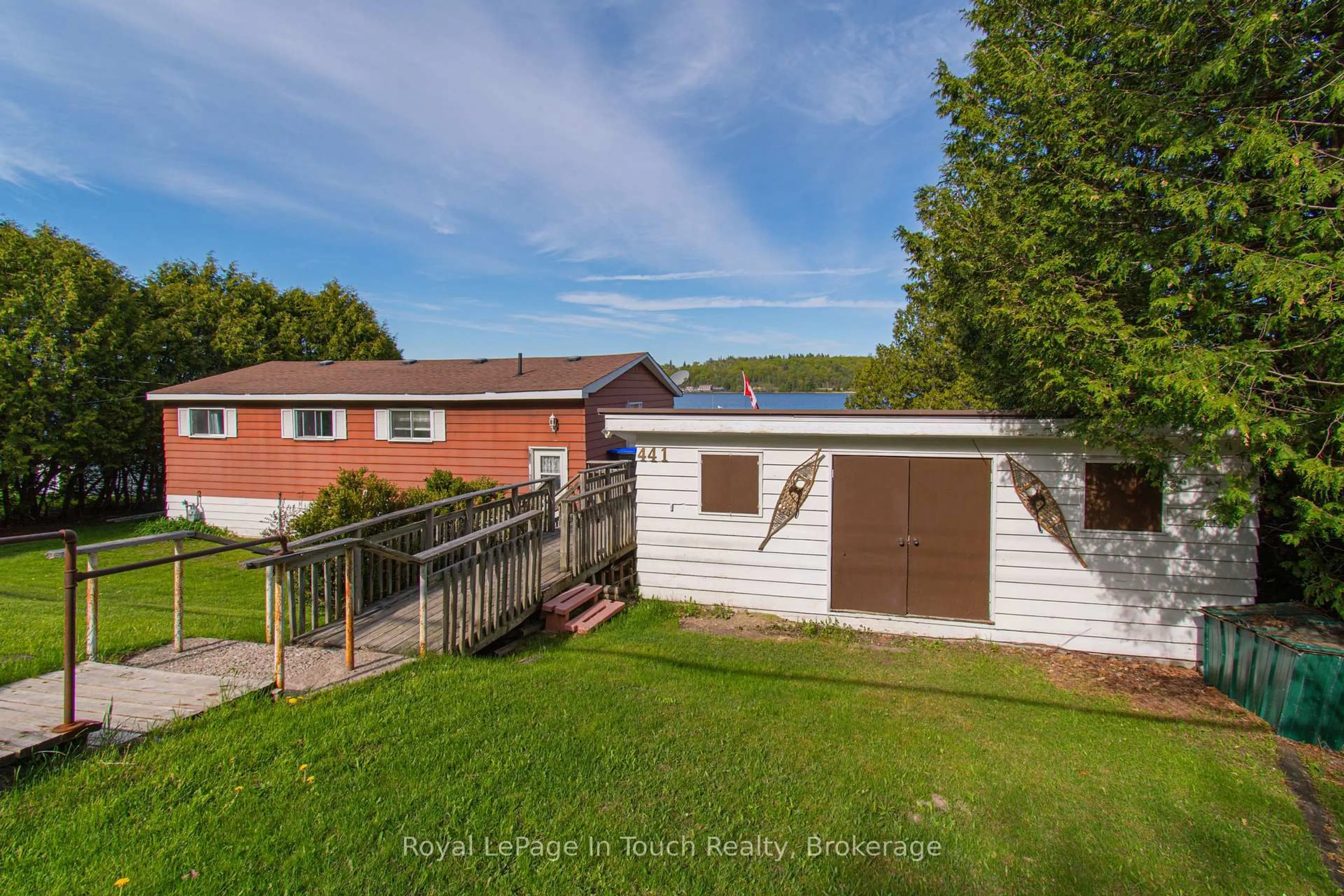 A pic from outside/outdoor area/front of a property/back of a property/a pic from drone, unknown for 441 Champlain Rd, Penetanguishene Ontario L9M 1S5