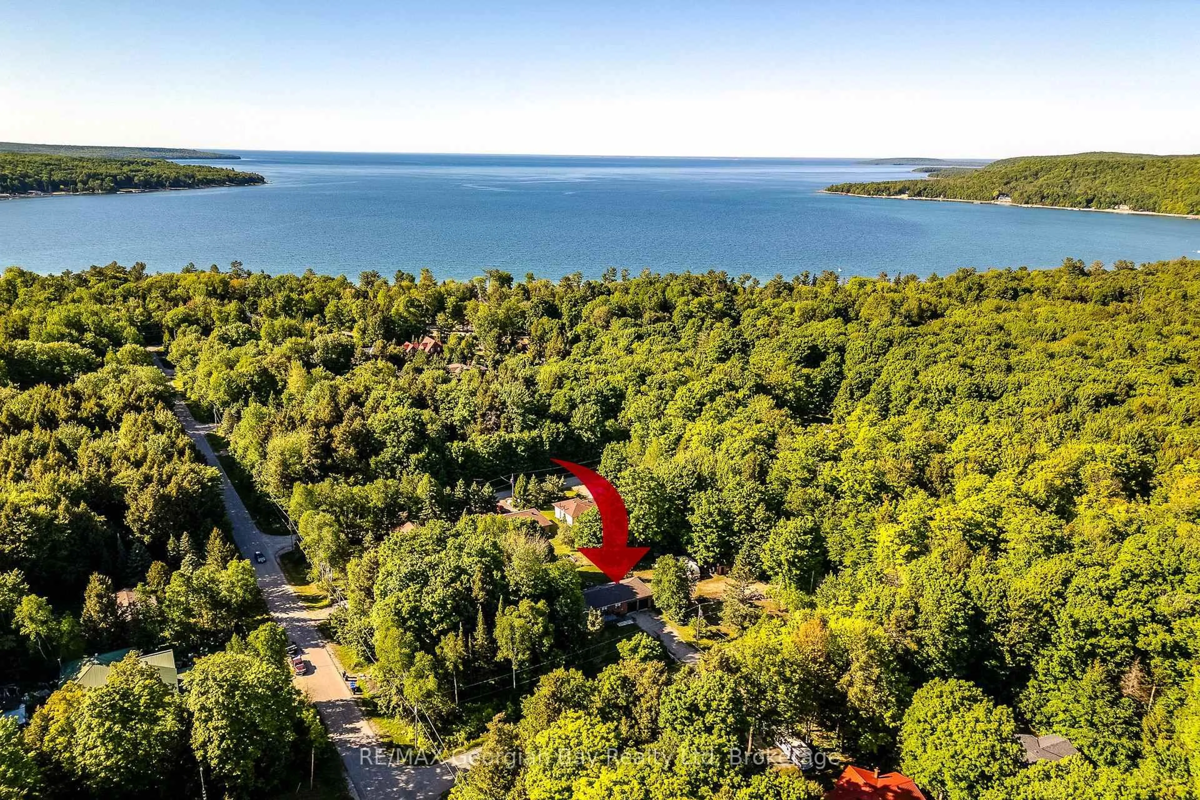 A pic from outside/outdoor area/front of a property/back of a property/a pic from drone, water/lake/river/ocean view for 50 Leonard Rd, Tiny Ontario L9M 2H7