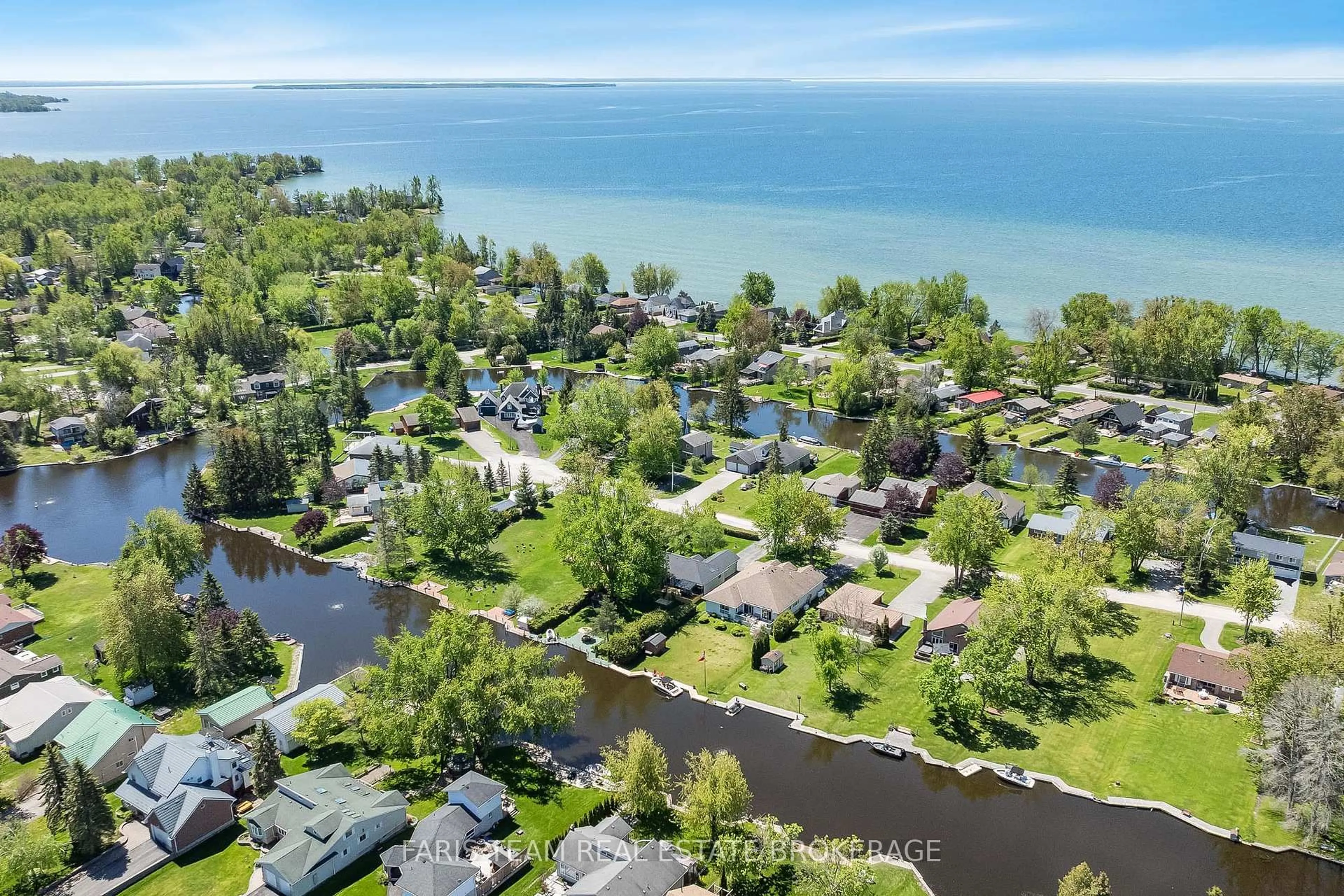 A pic from outside/outdoor area/front of a property/back of a property/a pic from drone, water/lake/river/ocean view for 19 Willow Cres, Ramara Ontario L0K 1B0