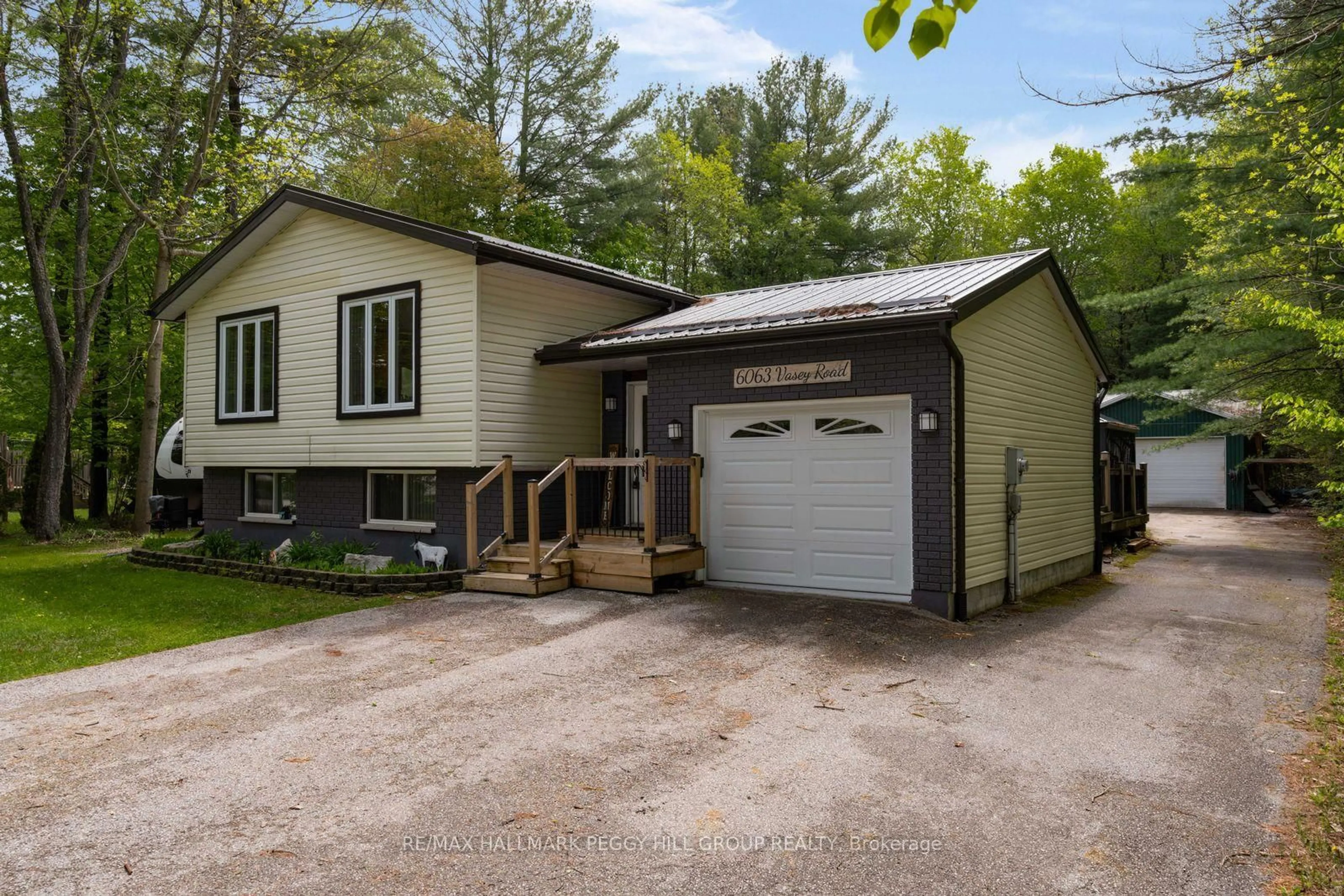 Home with vinyl exterior material, street for 6063 Vasey Rd, Tay Ontario L0L 1P0