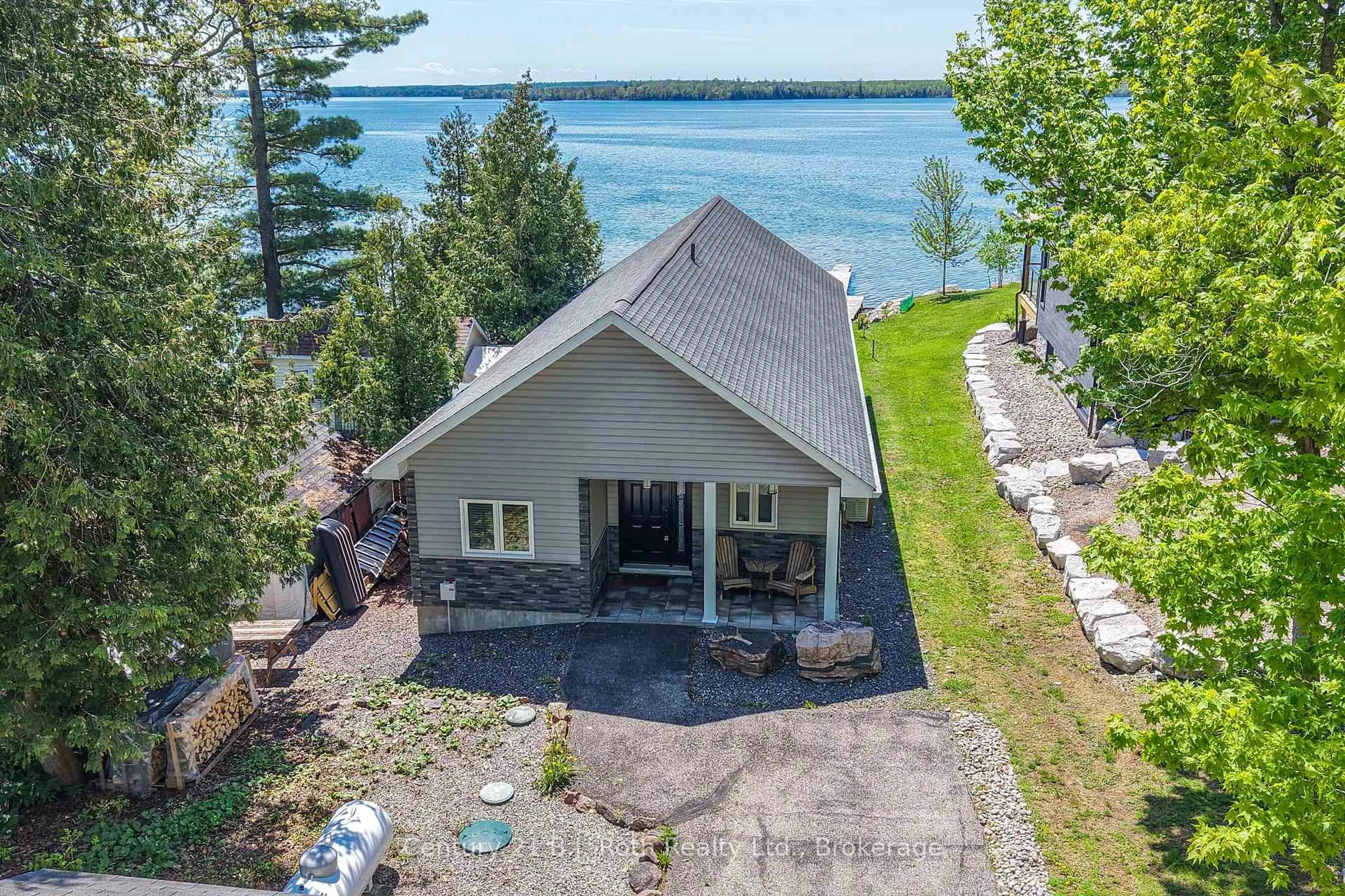 A pic from outside/outdoor area/front of a property/back of a property/a pic from drone, water/lake/river/ocean view for 7304 Glen Ellen Dr, Ramara Ontario L0K 2B0