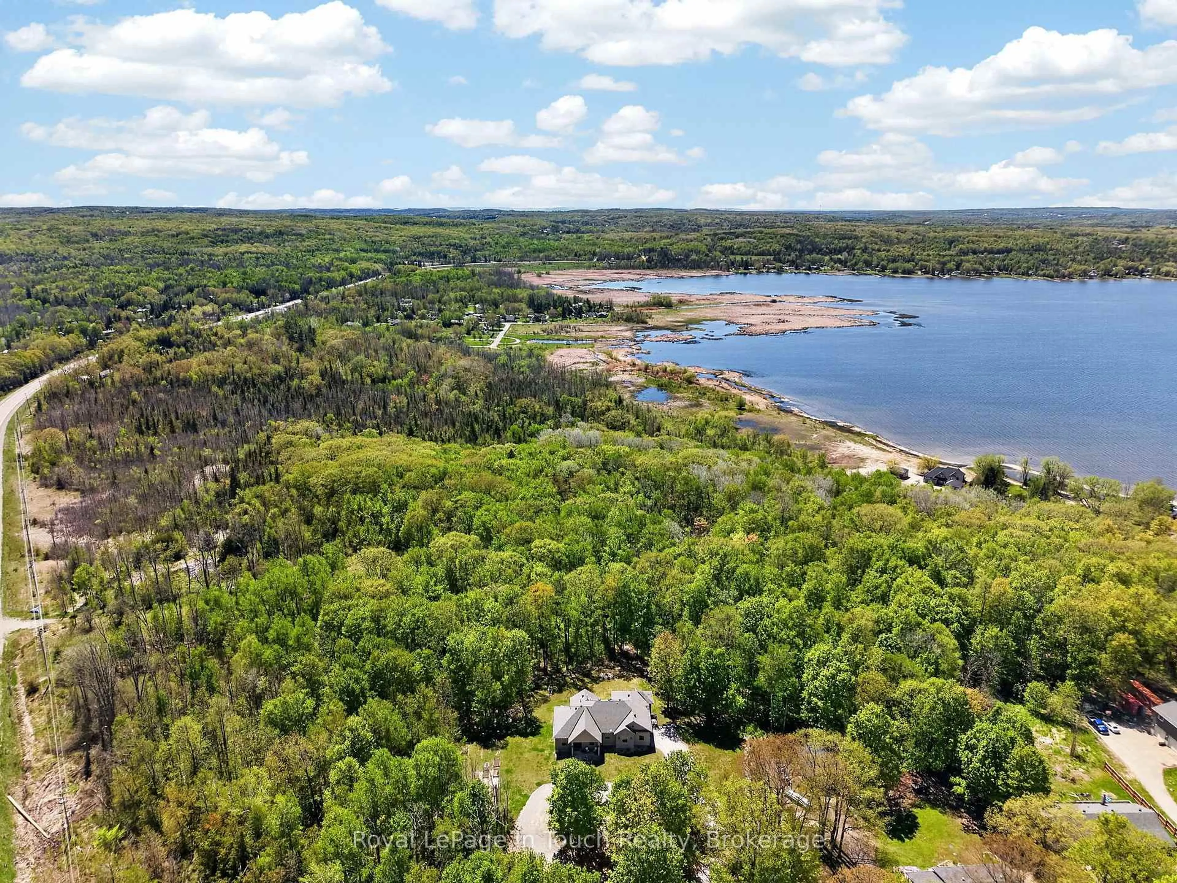 A pic from outside/outdoor area/front of a property/back of a property/a pic from drone, water/lake/river/ocean view for 62 Tanners Rd, Tay Ontario L0K 2C0