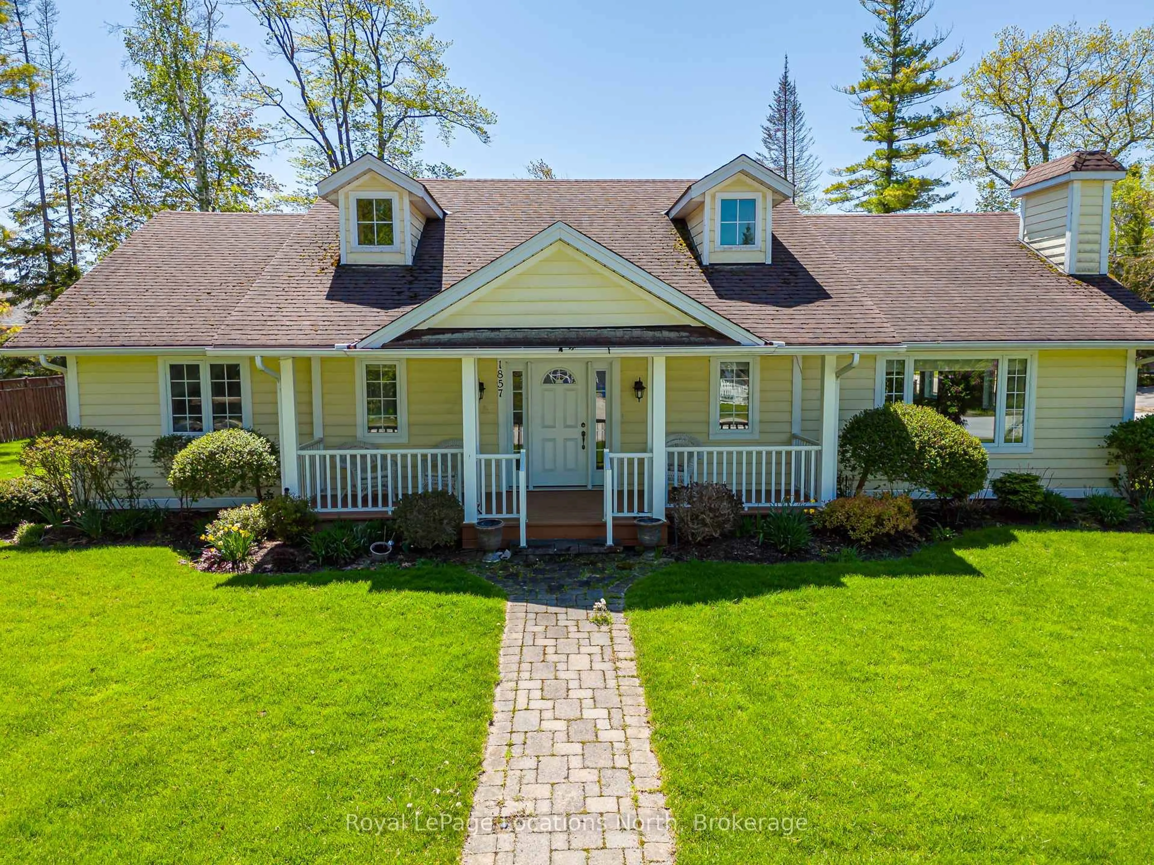 A pic from outside/outdoor area/front of a property/back of a property/a pic from drone, street for 1857 Shore Lane, Wasaga Beach Ontario L9Z 1V2