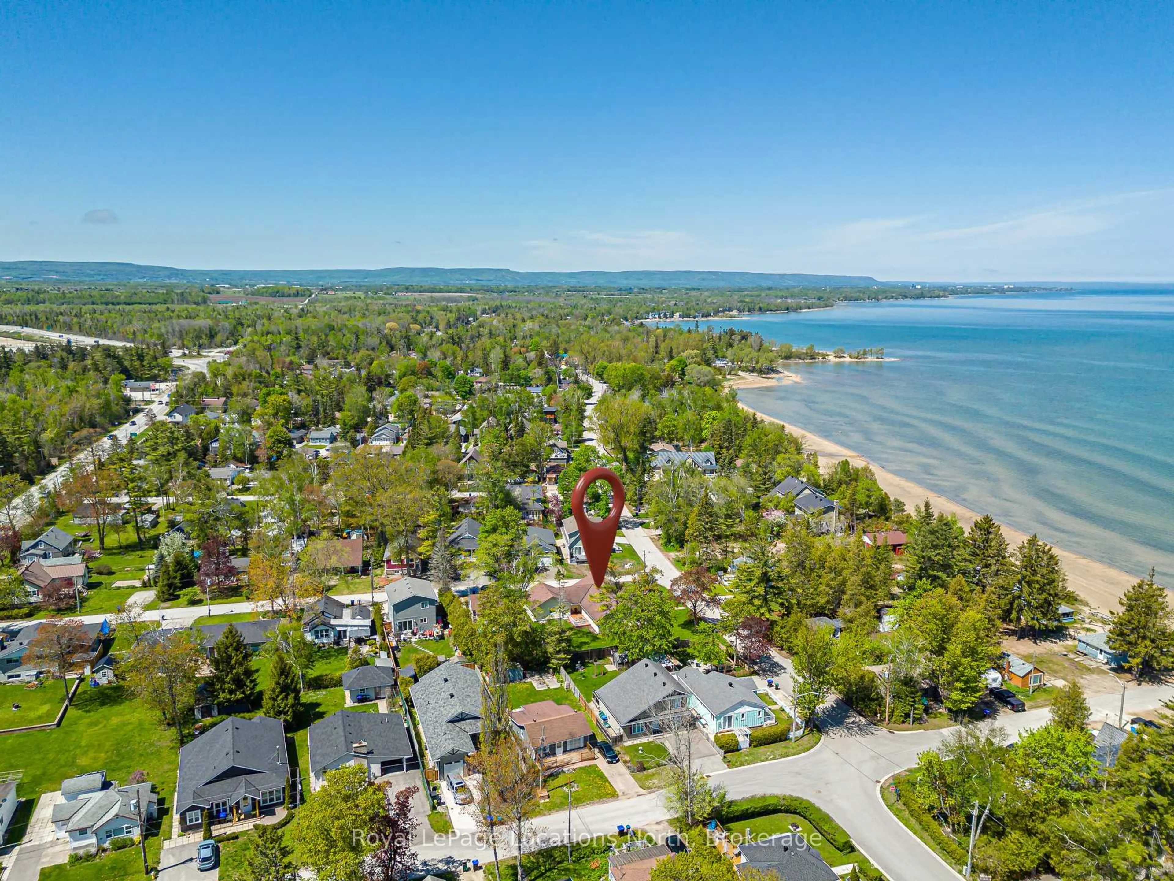 A pic from outside/outdoor area/front of a property/back of a property/a pic from drone, water/lake/river/ocean view for 1857 Shore Lane, Wasaga Beach Ontario L9Z 1V2