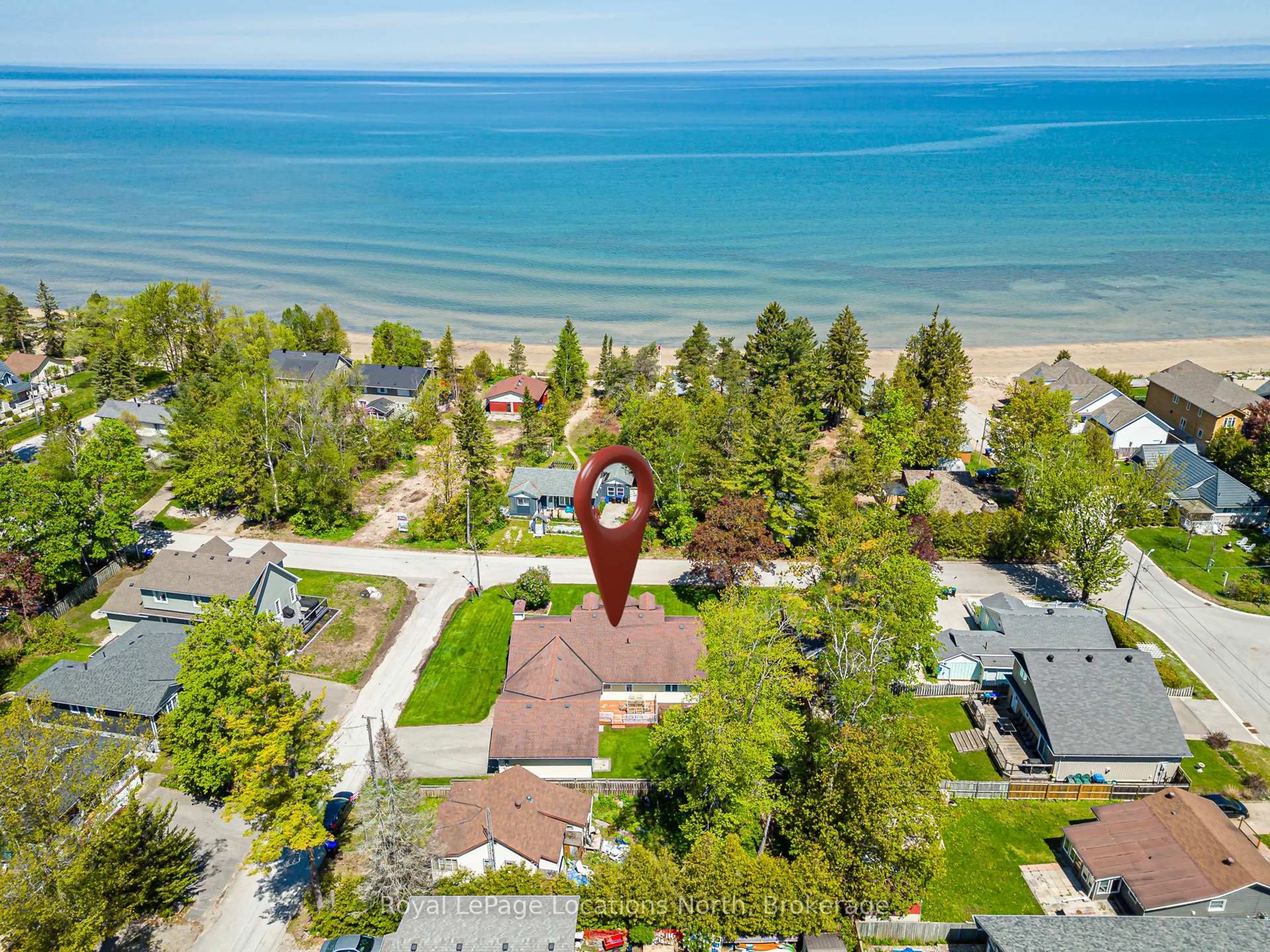 A pic from outside/outdoor area/front of a property/back of a property/a pic from drone, water/lake/river/ocean view for 1857 Shore Lane, Wasaga Beach Ontario L9Z 1V2