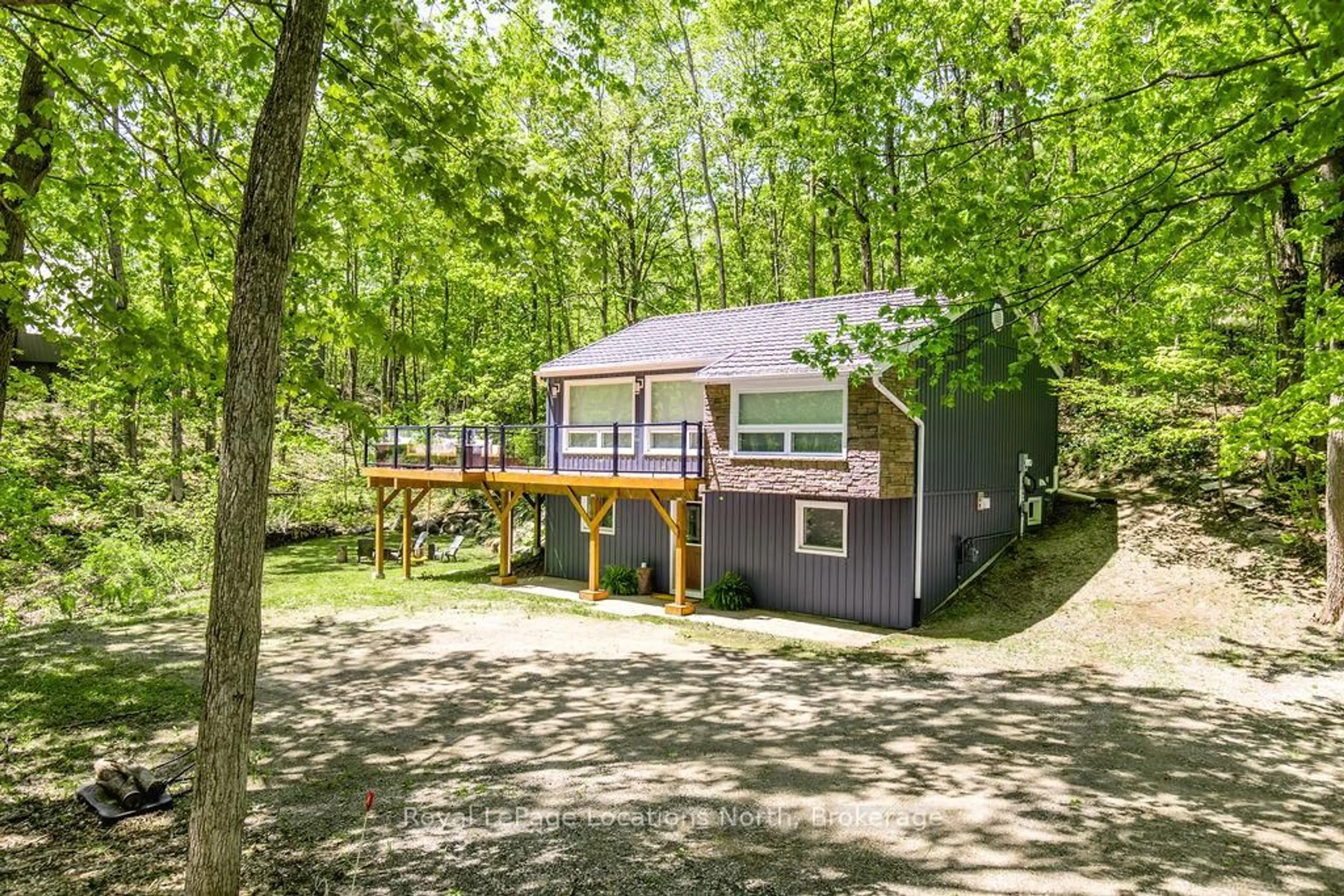 A pic from outside/outdoor area/front of a property/back of a property/a pic from drone, unknown for 1 Iroquois Rdge, Oro-Medonte Ontario L0K 1E0